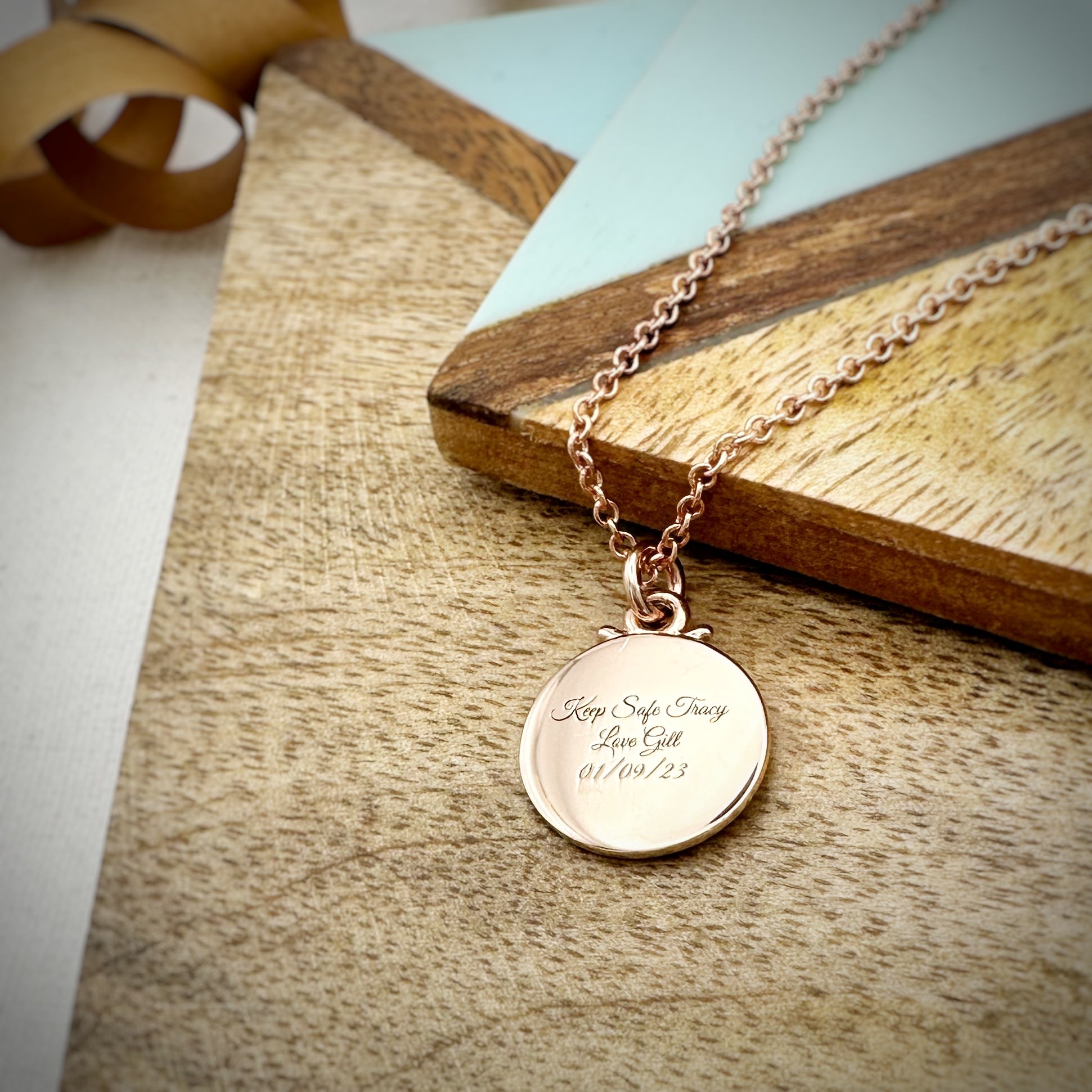 rose gold compass travel safe necklace solid rose gold engraved on the back