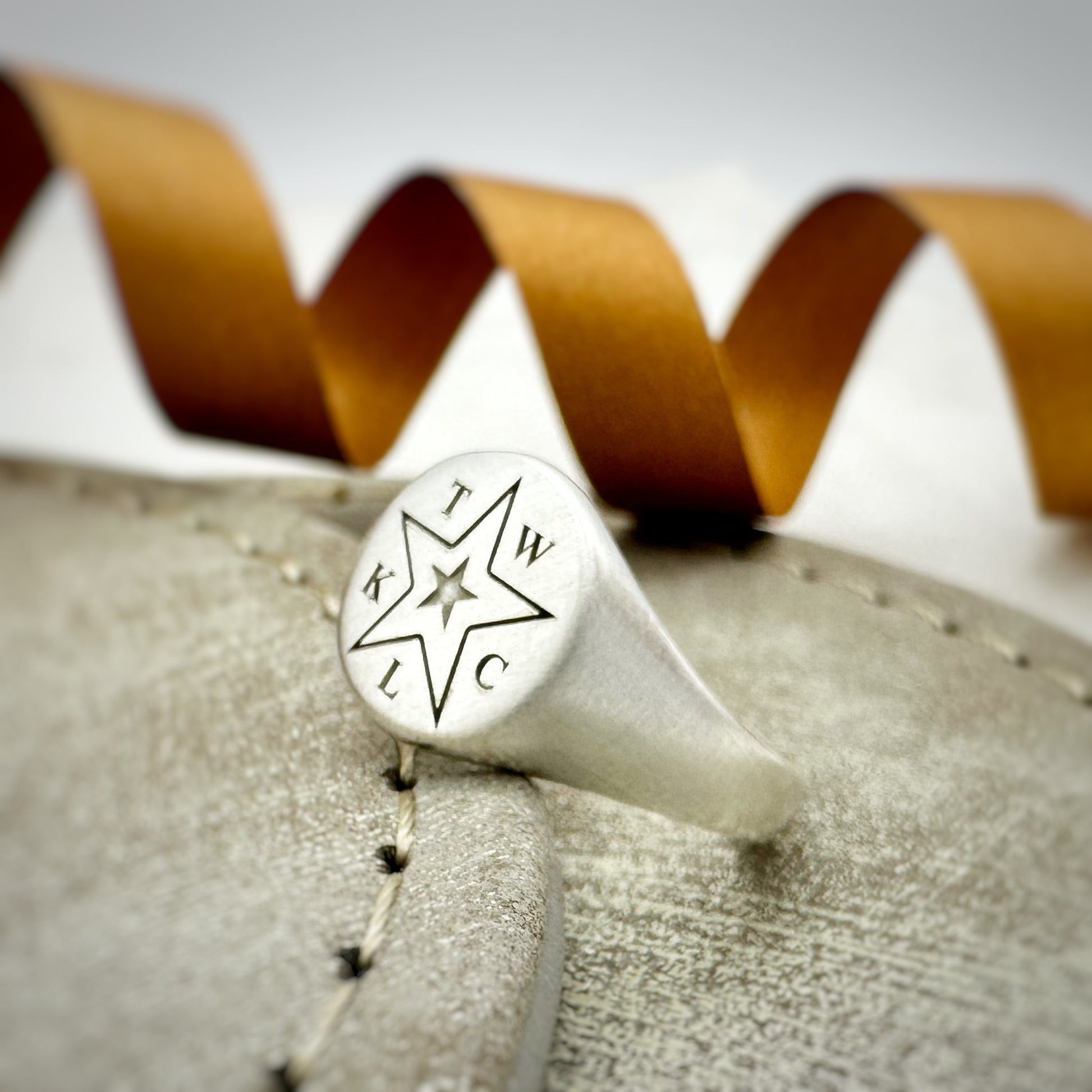 initials and star on solid silver mens pinky signet ring