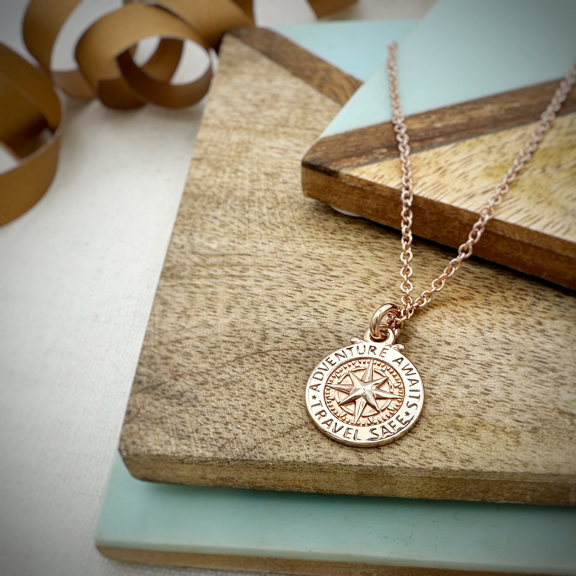 rose gold compass travel safe necklace solid rose gold engraved on the back