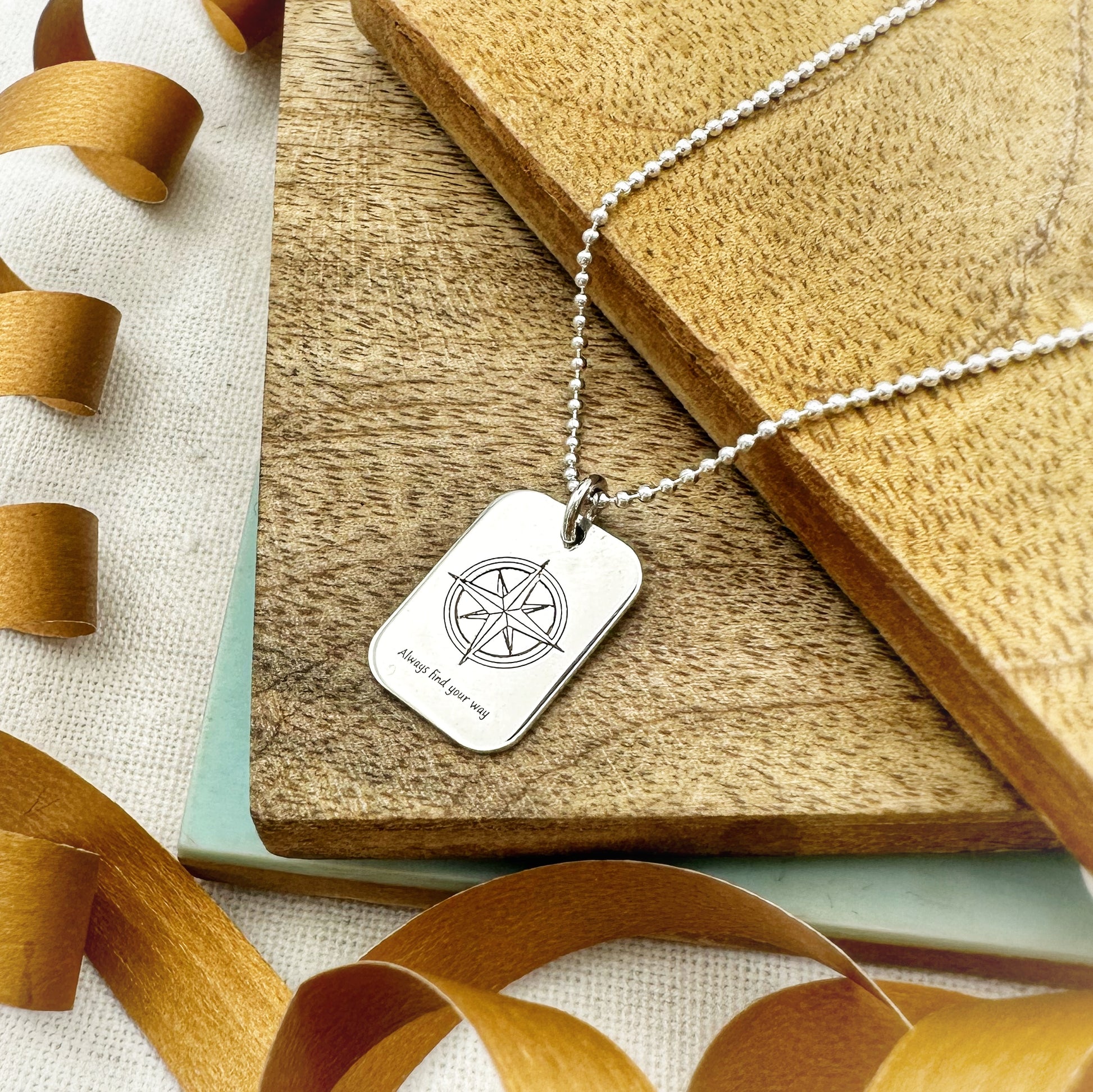 small silver compass dog tag necklace