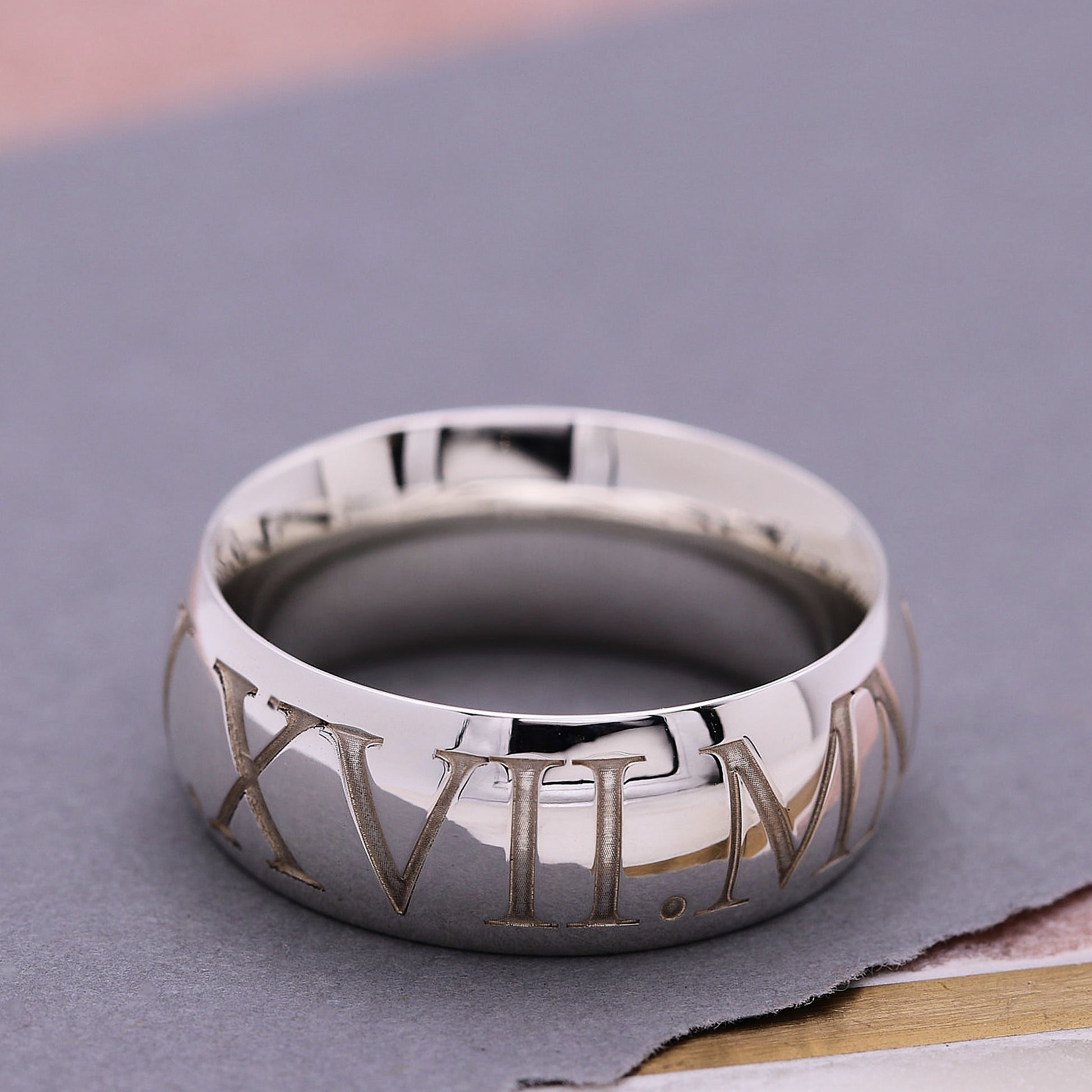10mm wide silver ring engraved with roman numerals date polished finish 18th birthday