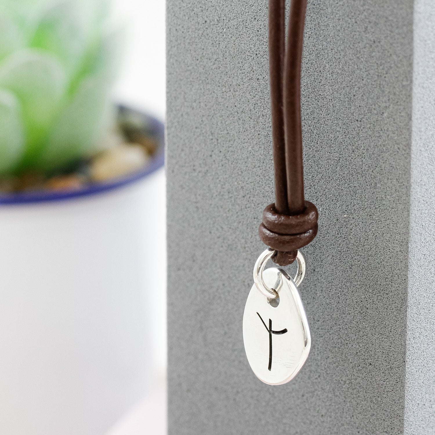 travel rune silver pendant on leather cord