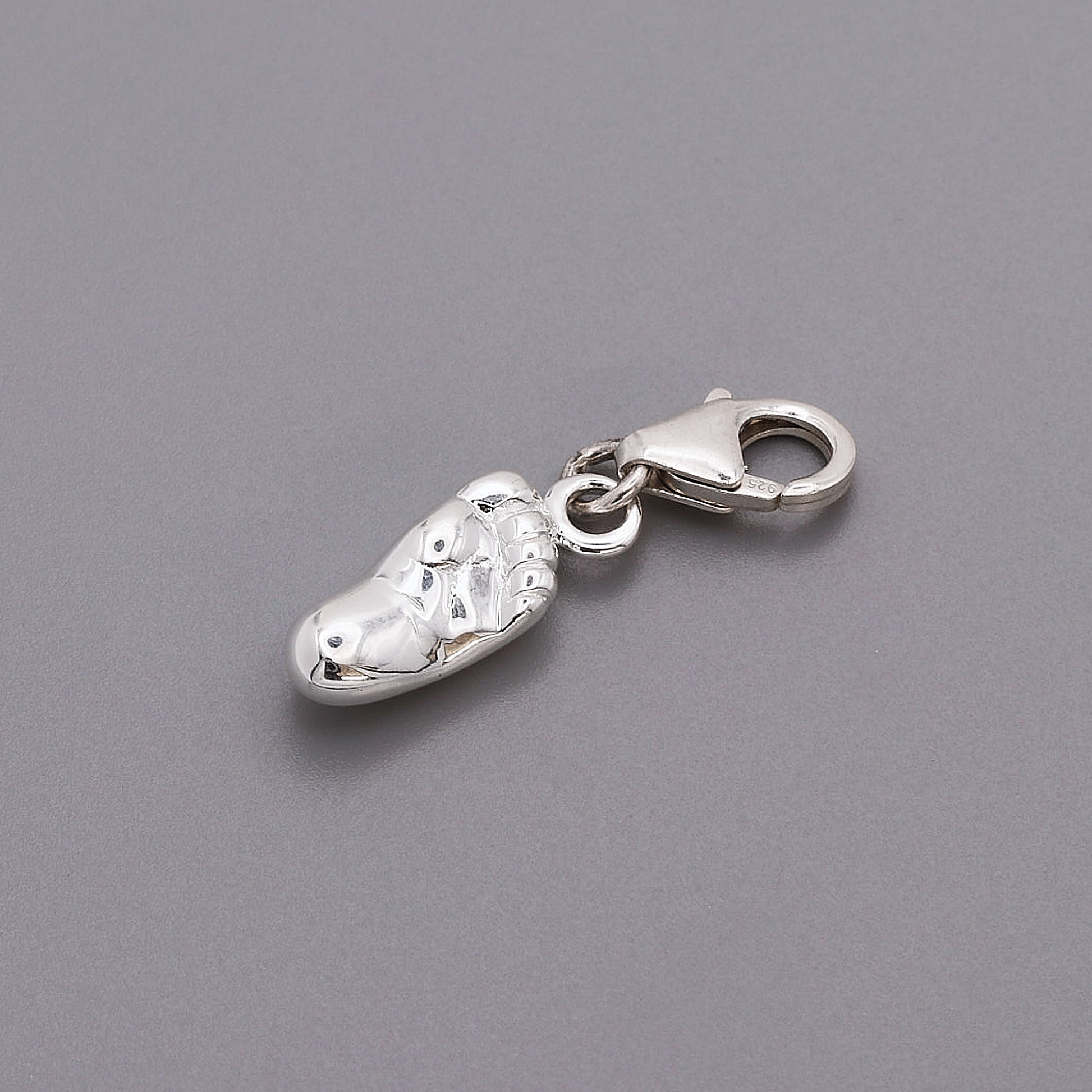 silver baby foot charm with clip on clasp
