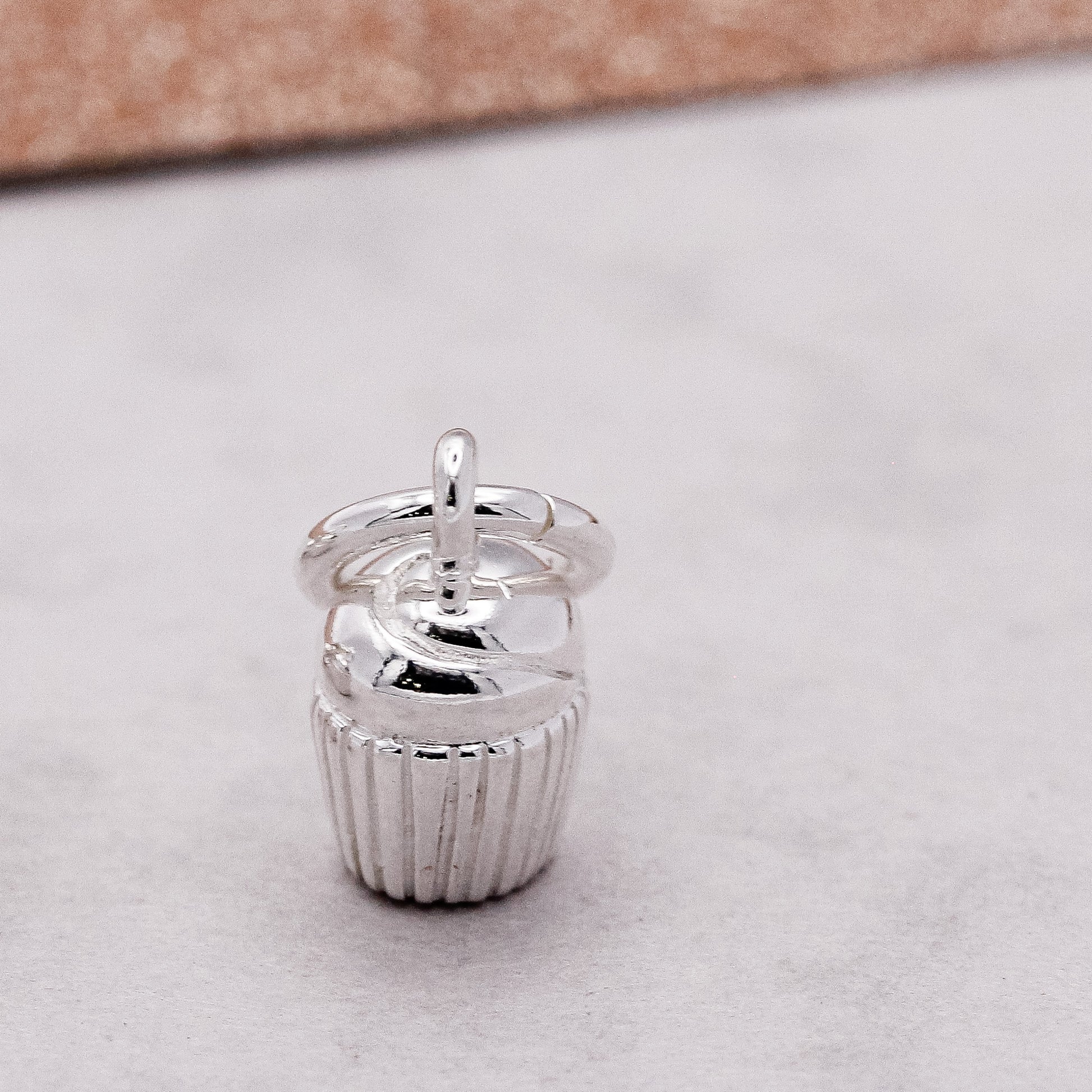 silver cupcake charm for bracelets with traditional jump ring
