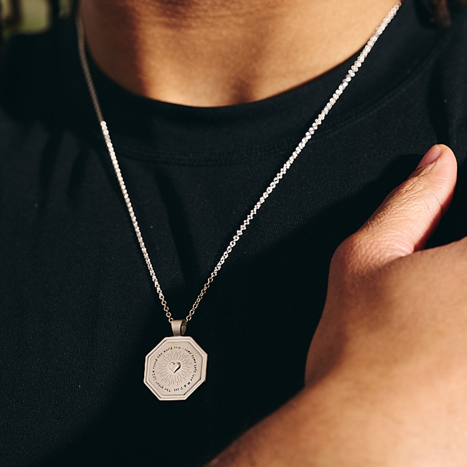 sacred heart journey octagon silver pendant with raised heart on trace chain