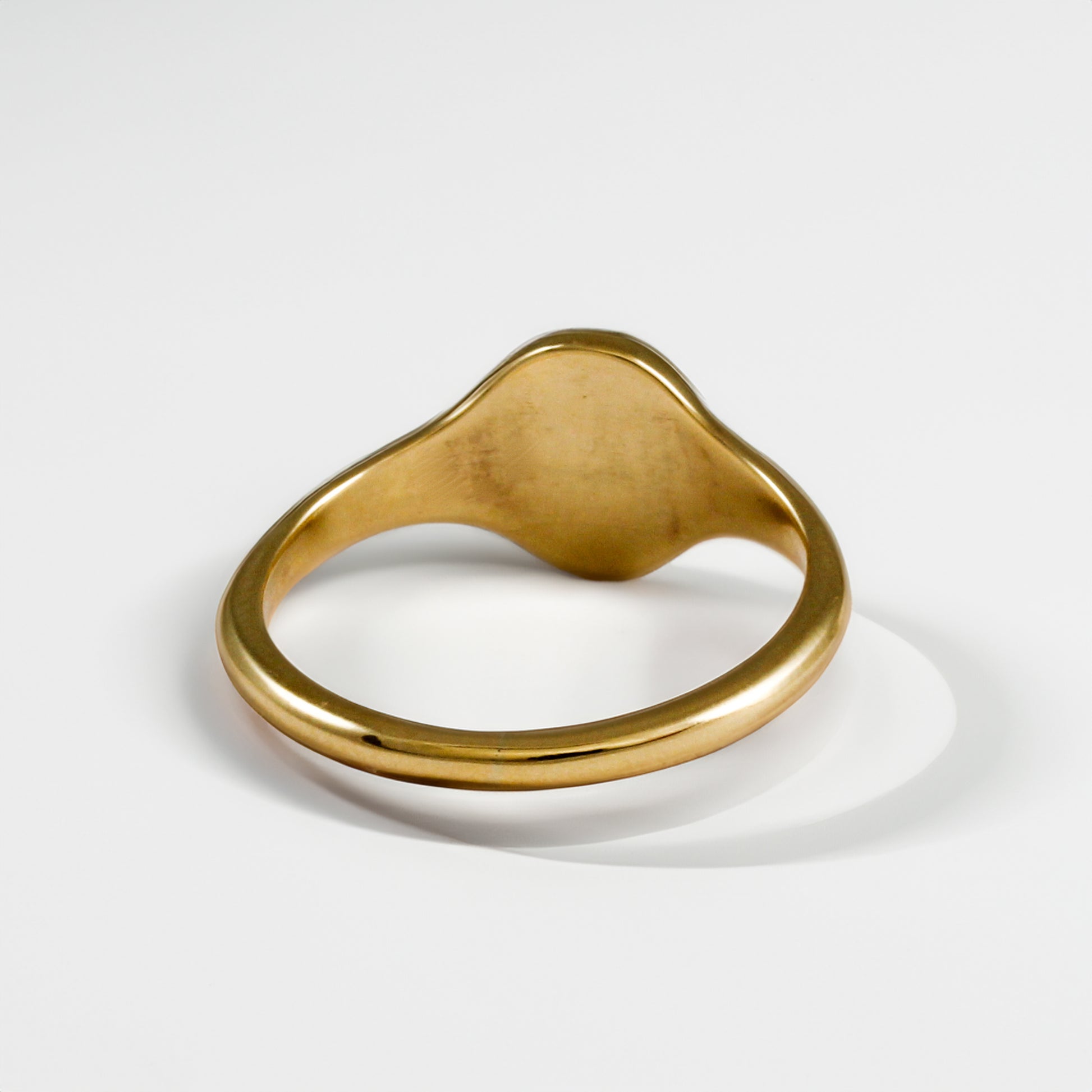 small sized solid gold signet ring