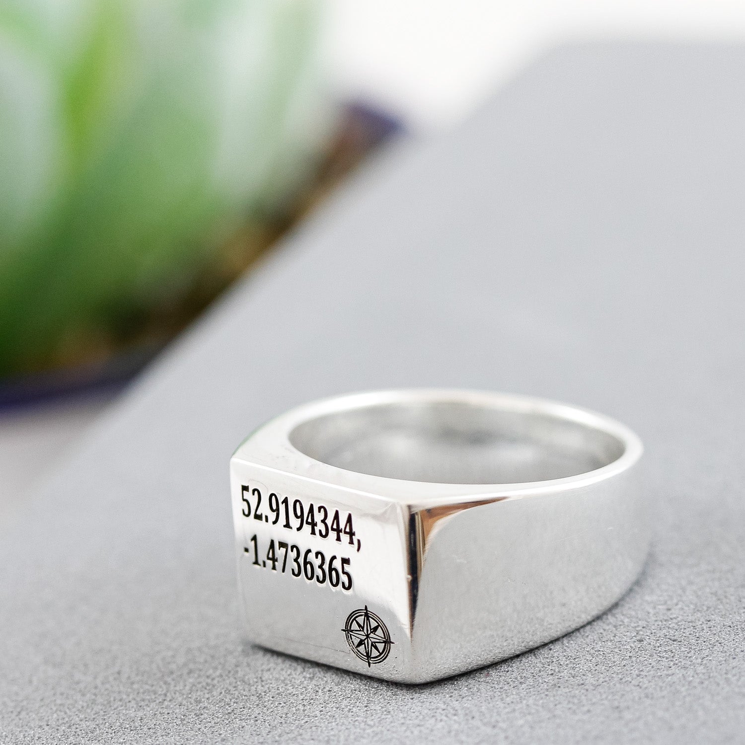 silver mens signet rings with latitude longitude coordinates and compass symbol