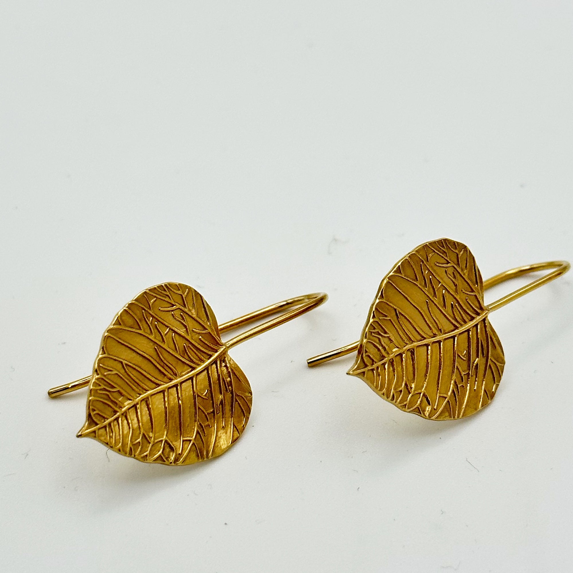 Medium leaf gold plated drop earrings