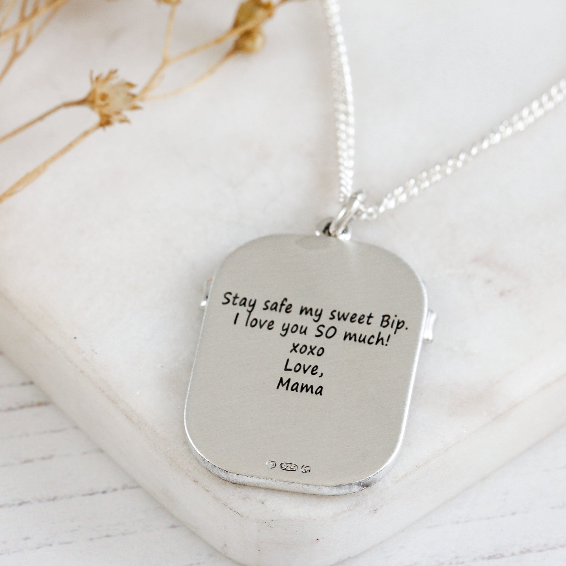 matte finish engraved back of Protecus St Christopher dog tag necklace