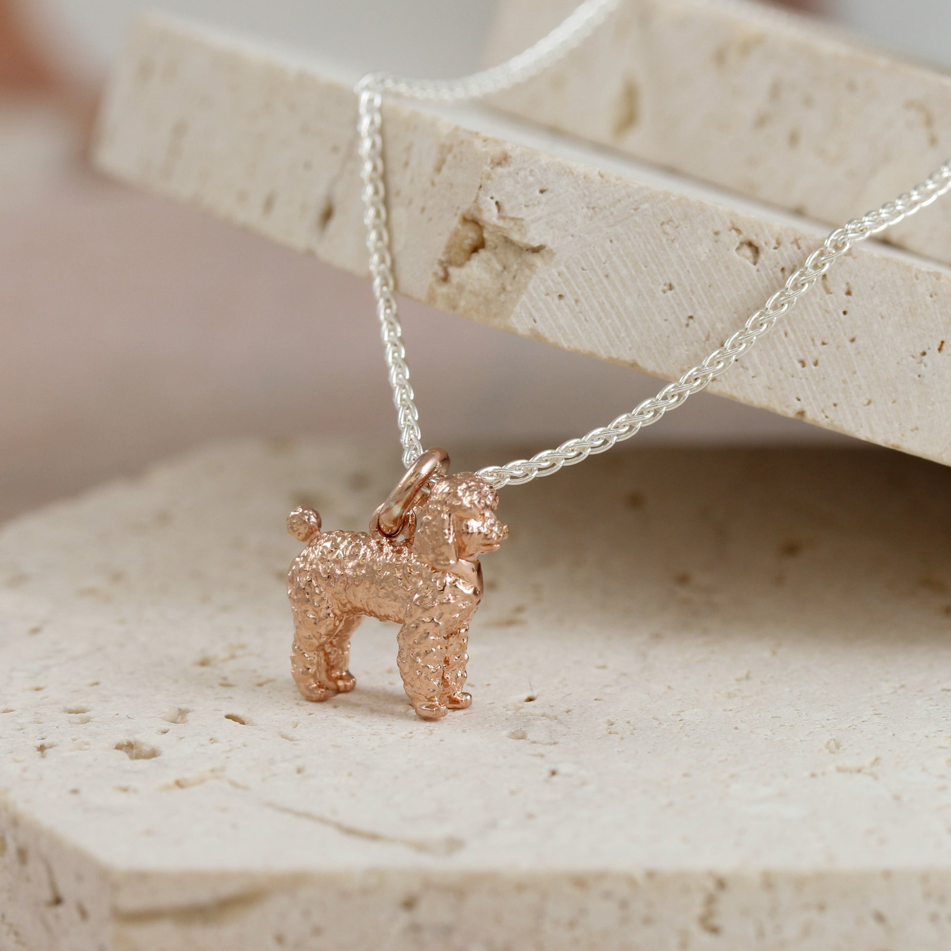 rose gold poodle pendant on silver chain