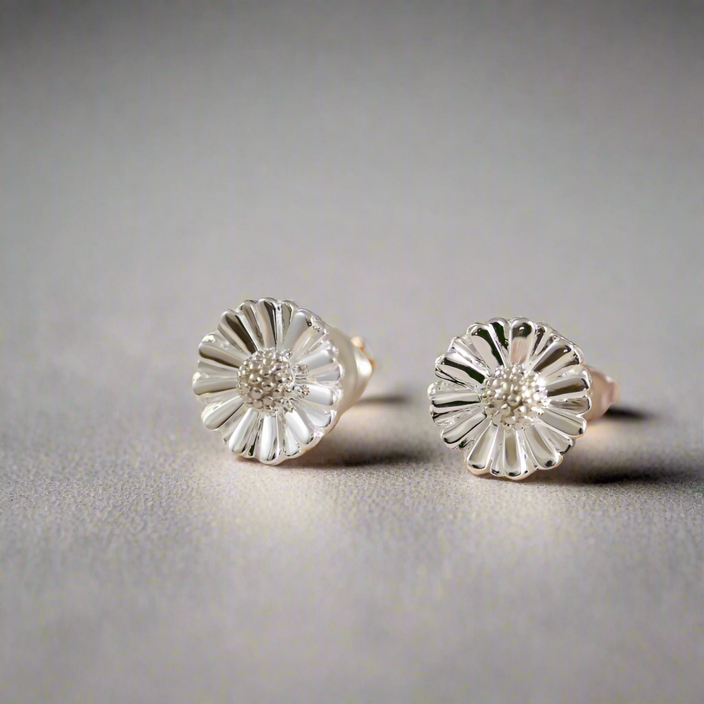 Silver daisy flower stud earrings