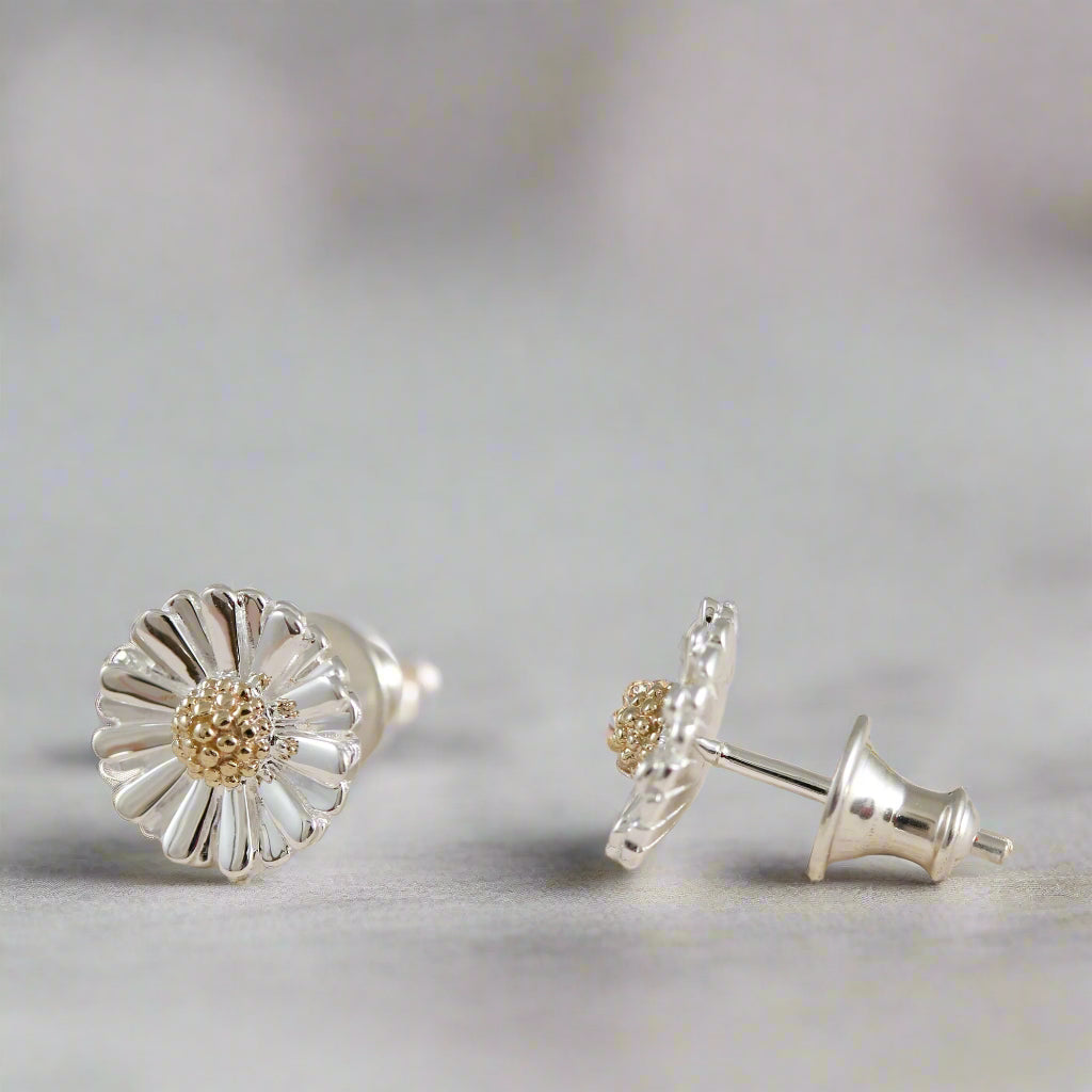 silver and solid gold daisy flower studs