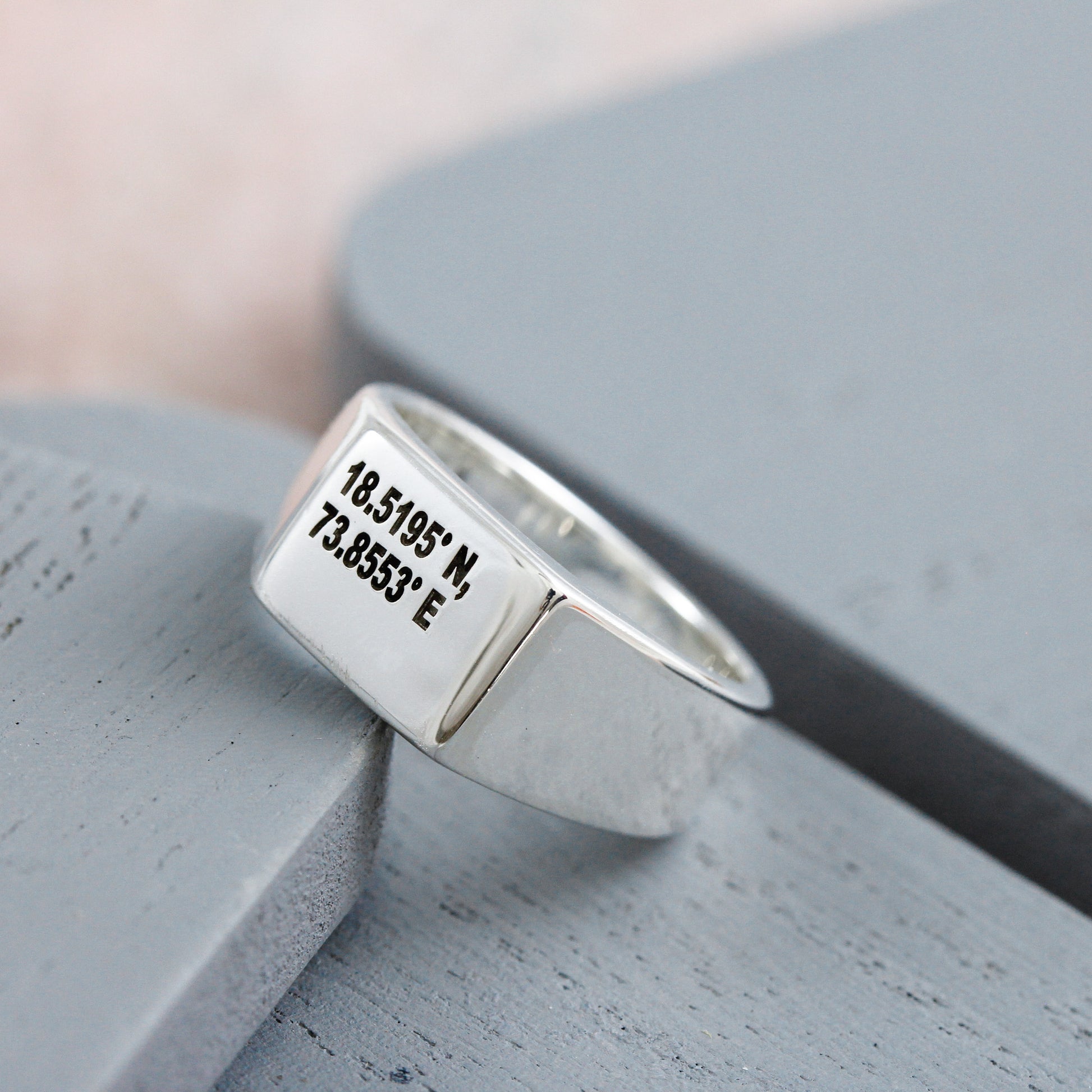 coordinates silver mans signet ring with engraved location