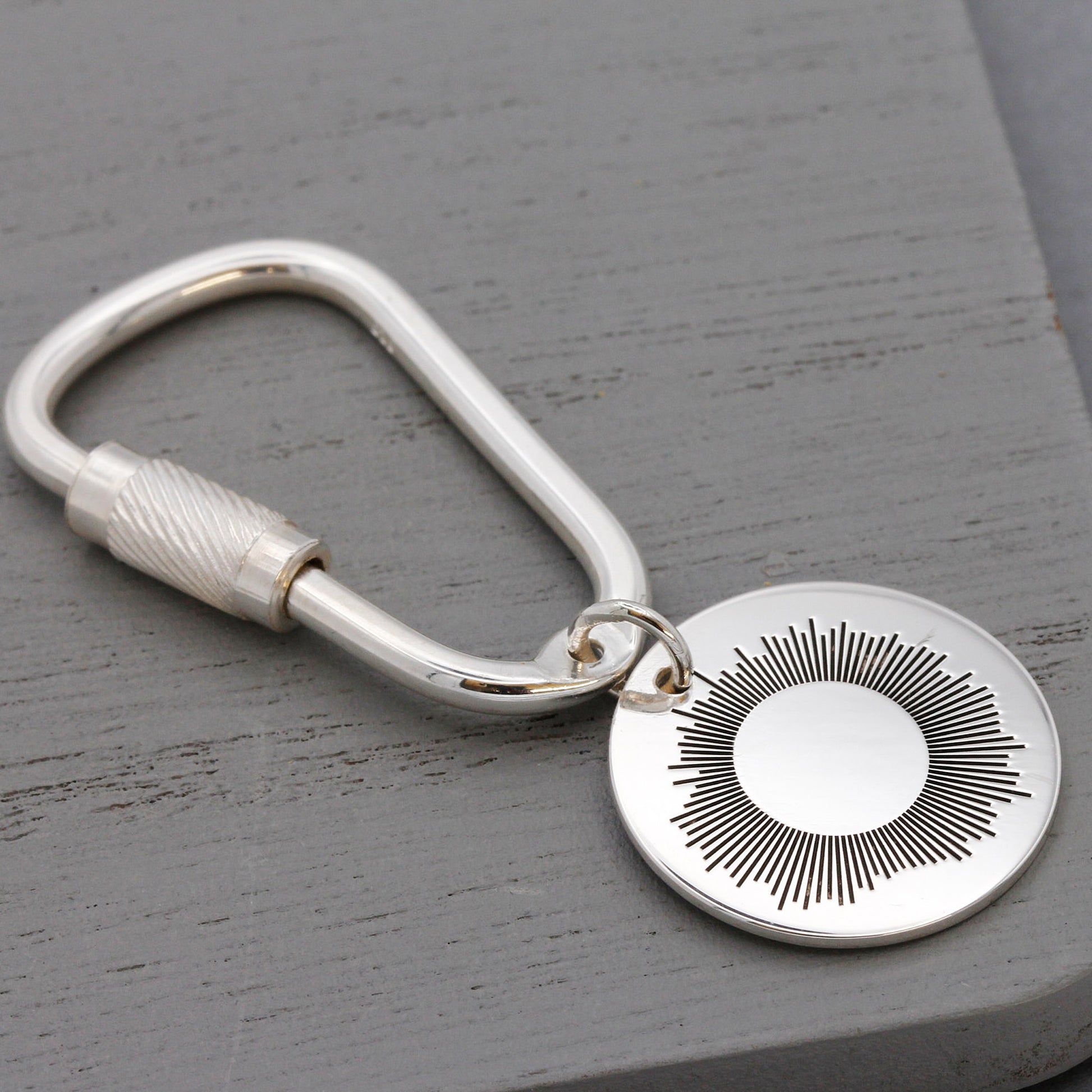 silver song wave keyring dire straits