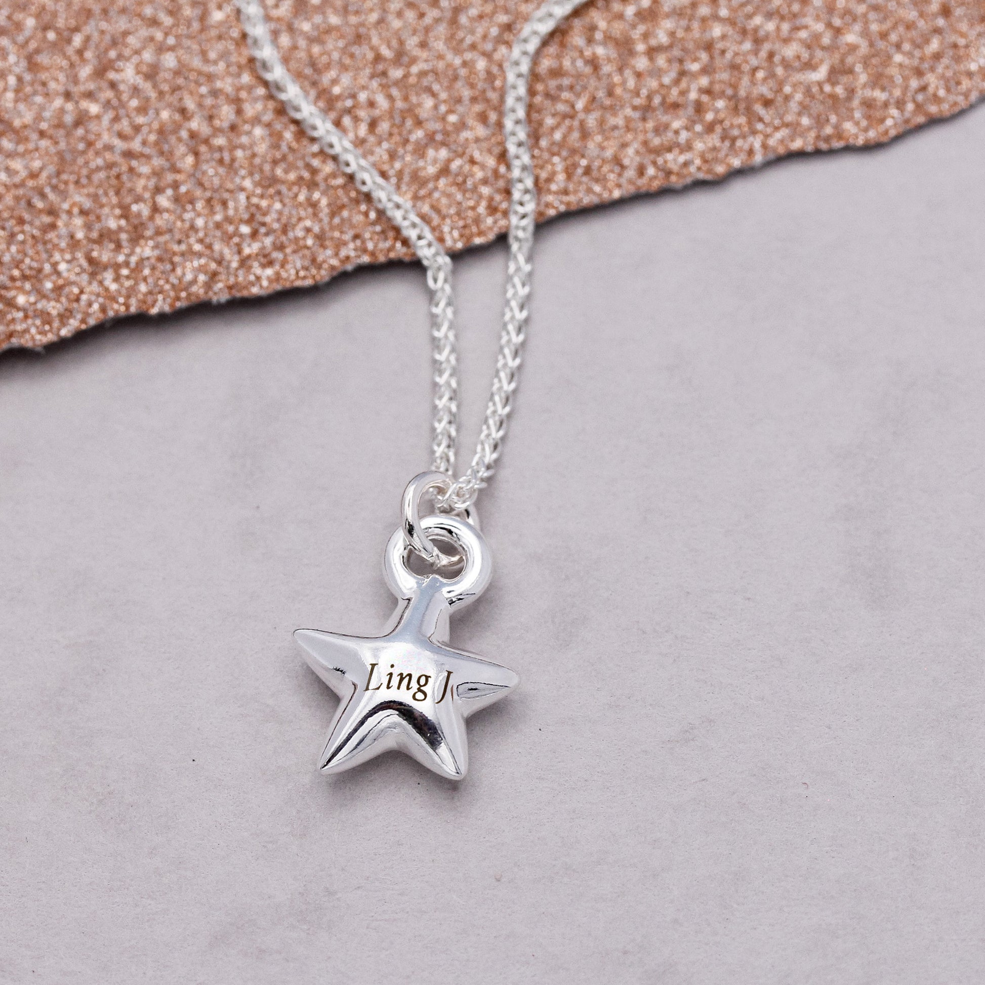 silver star charm necklace with engraved name