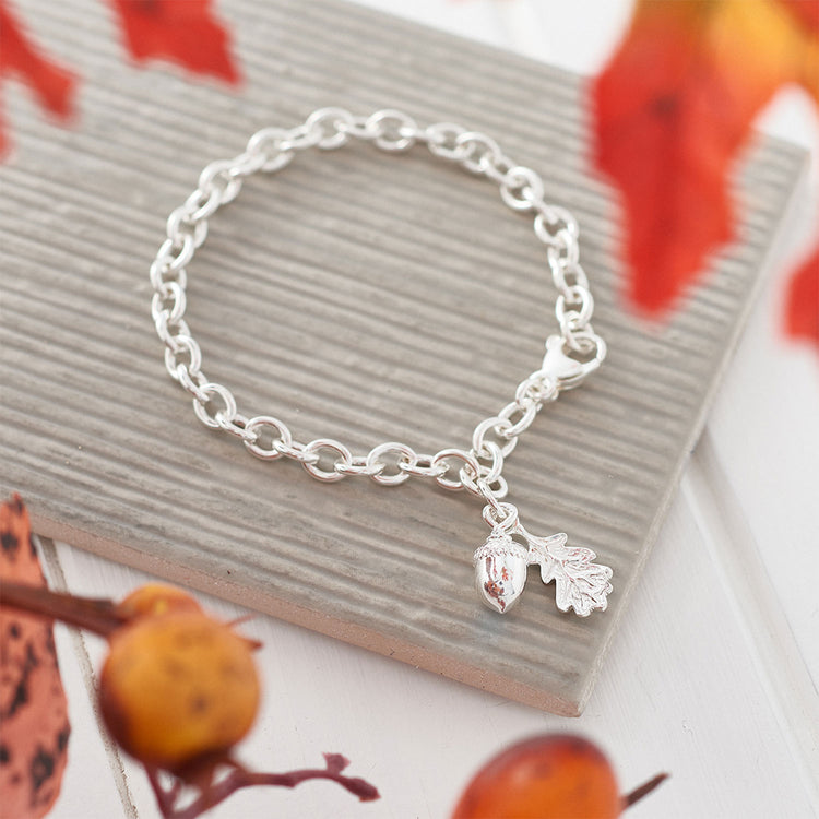 tiny-beginnings-acorn-oak-leaf-christening-bracelet.jpg__PID:70a6b642-baa3-4eb9-ab07-9fb6674c65a3