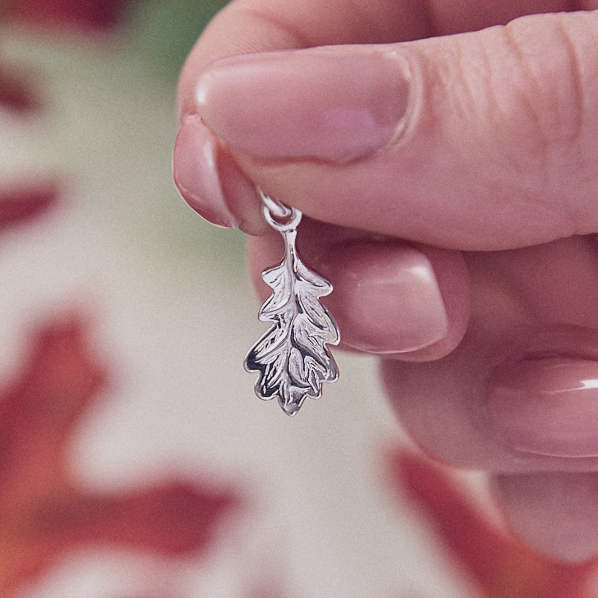 Load video: silver oak leaf bracelet charm by scarlett jewellery UK