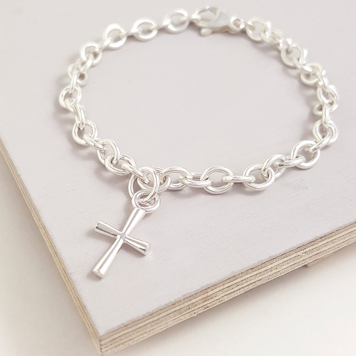 Silver cross charm necklace or bracelet Christening gift from Scarlett Jewellery UK