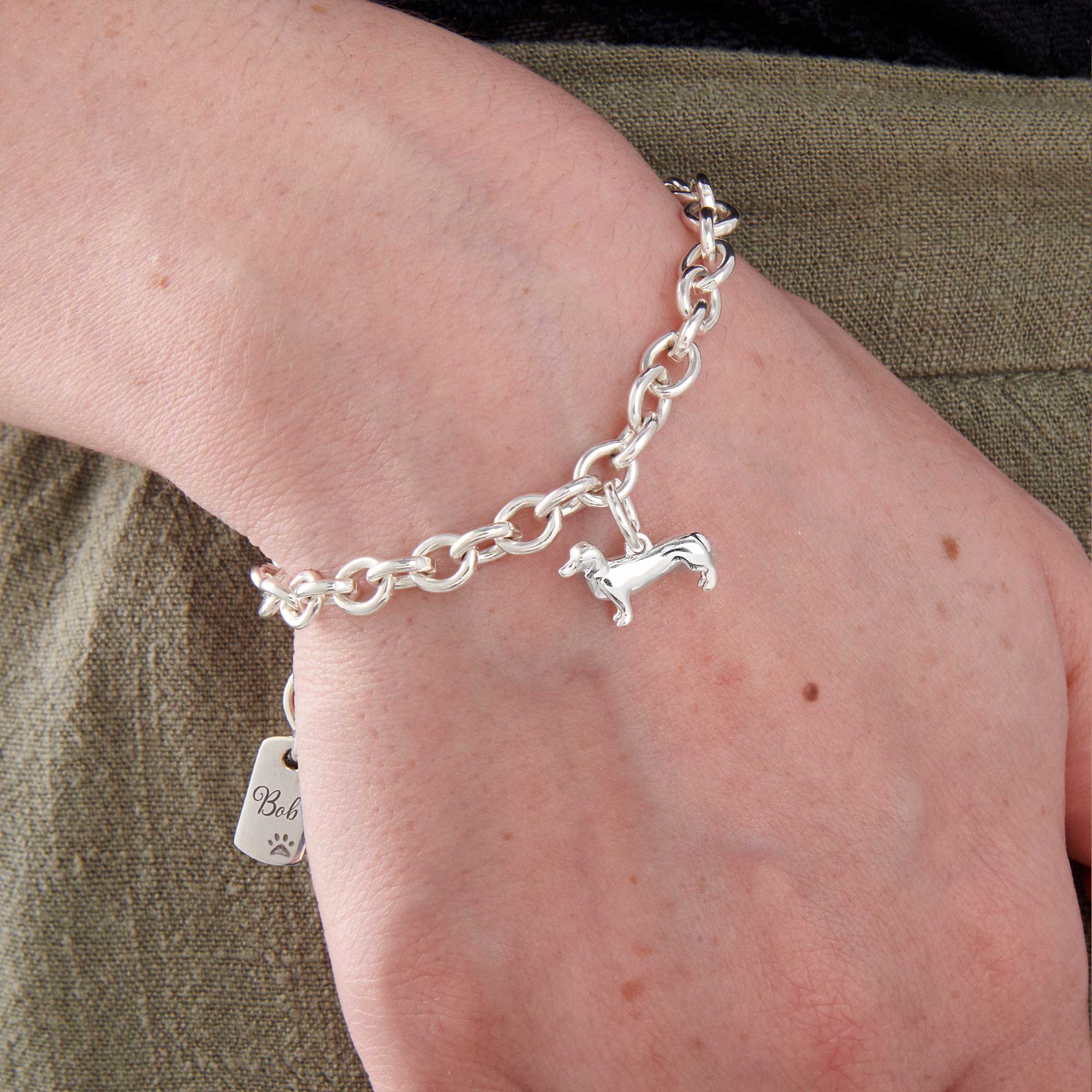 dachshund silver charm bracelet with personalised engraved dog tag scarlett jewellery