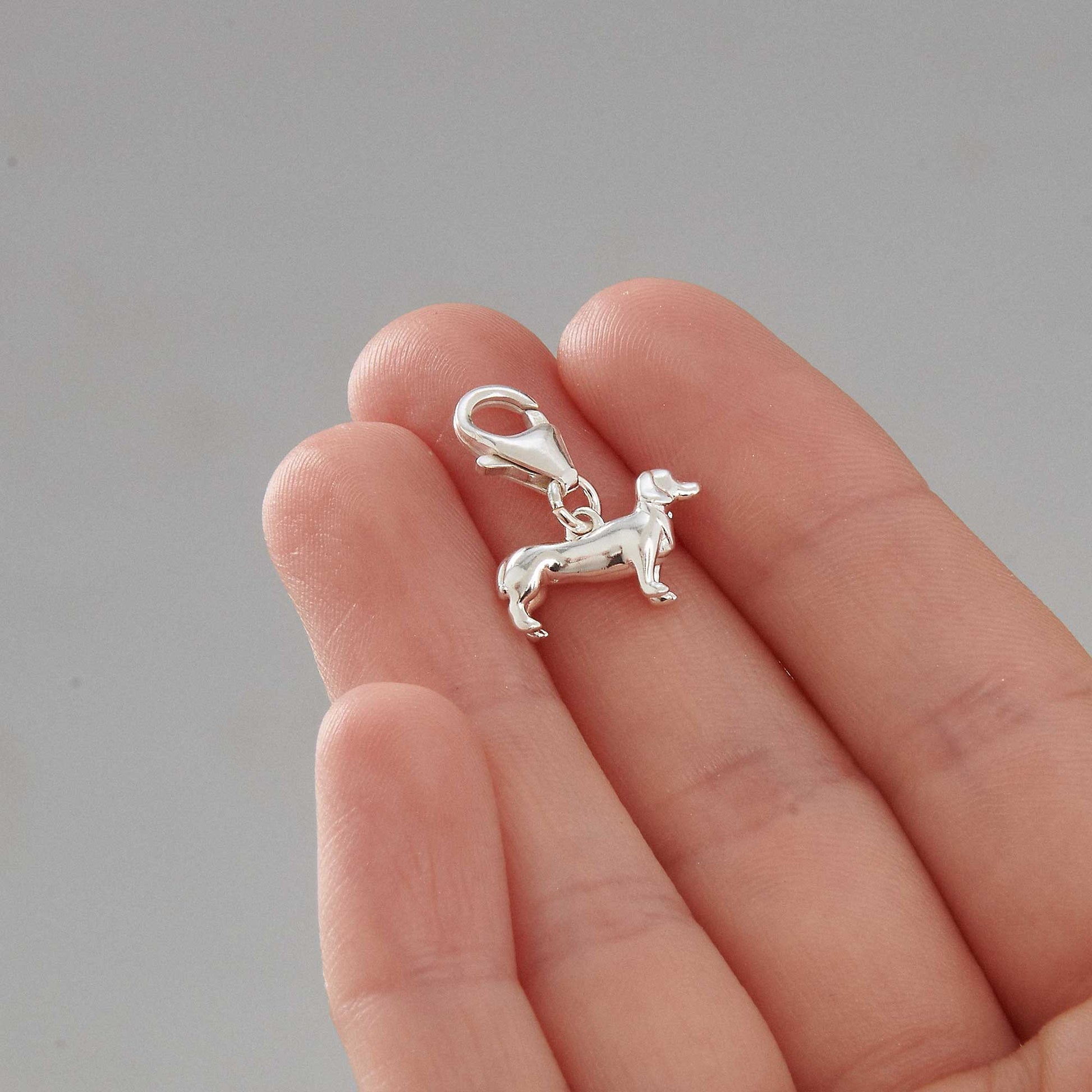 Dachshund sausage dog silver dog breed solid sterling silver dog charm with clip lobster clasp Scarlett Jewellery Ltd