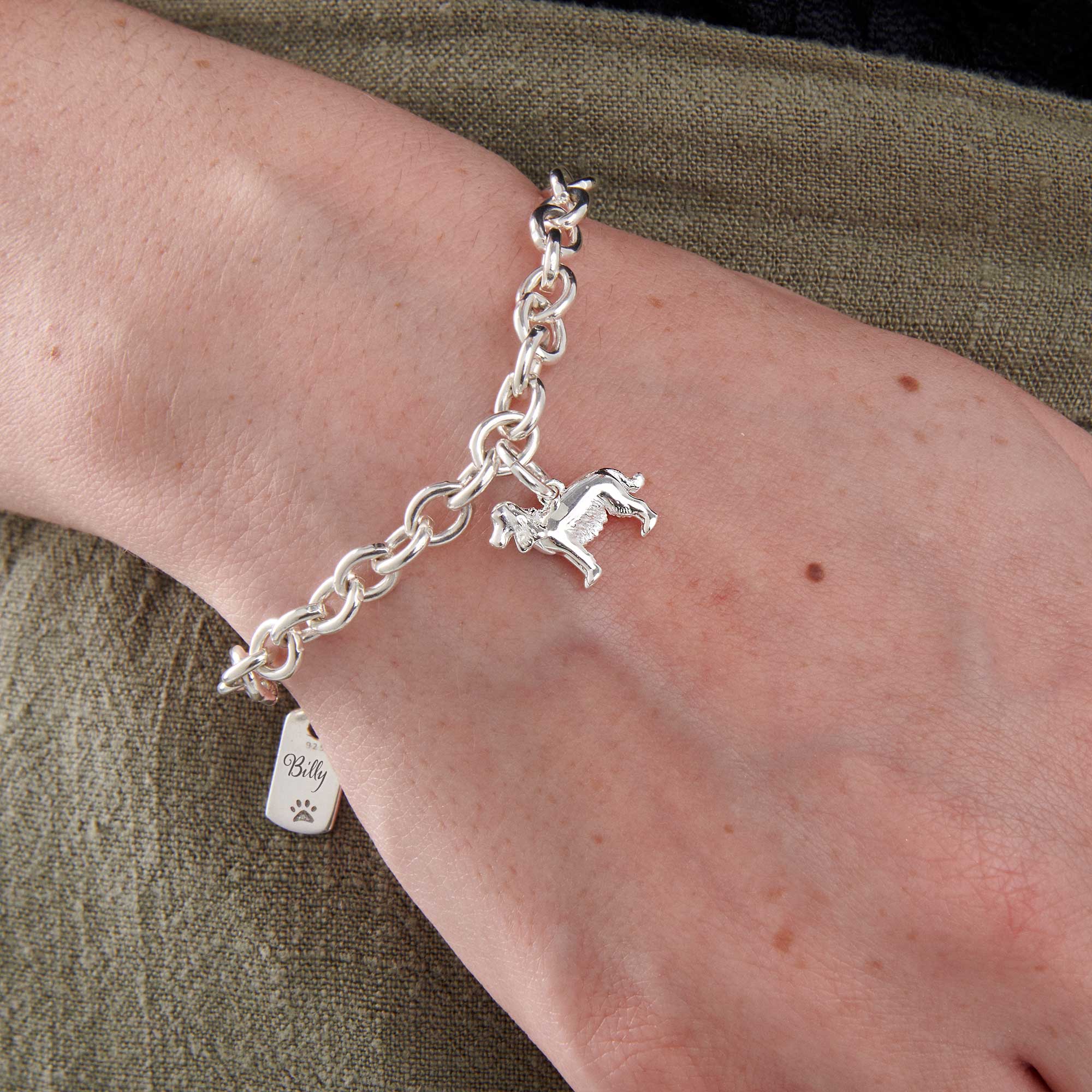english cocker spaniel silver charm bracelet with personalised engraved dog tag scarlett jewellery