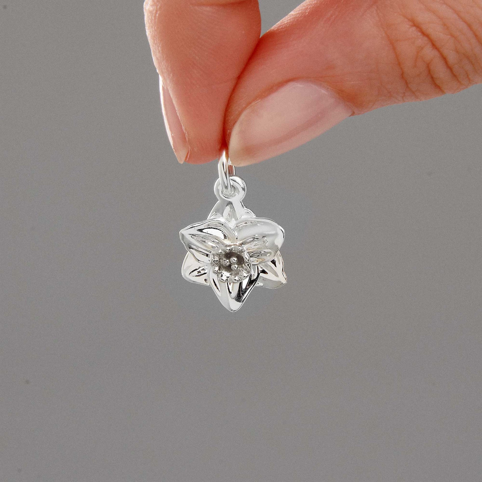 solid silver daffodil flower charm scarlett jewellery for chelsea flower show