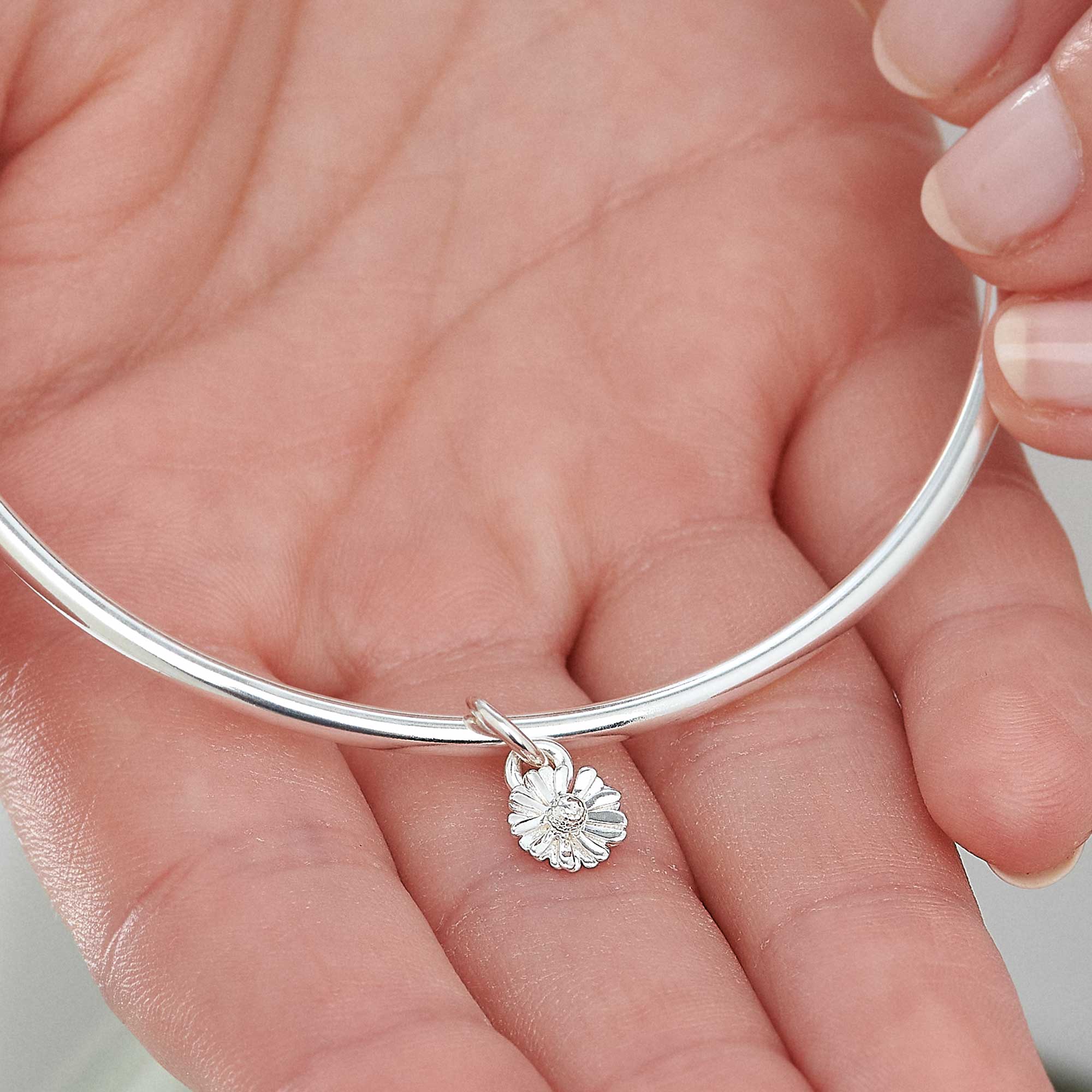 tiny daisy flower silver bangle nature inspired jewellery chelsea flower show scarlett Jewellery