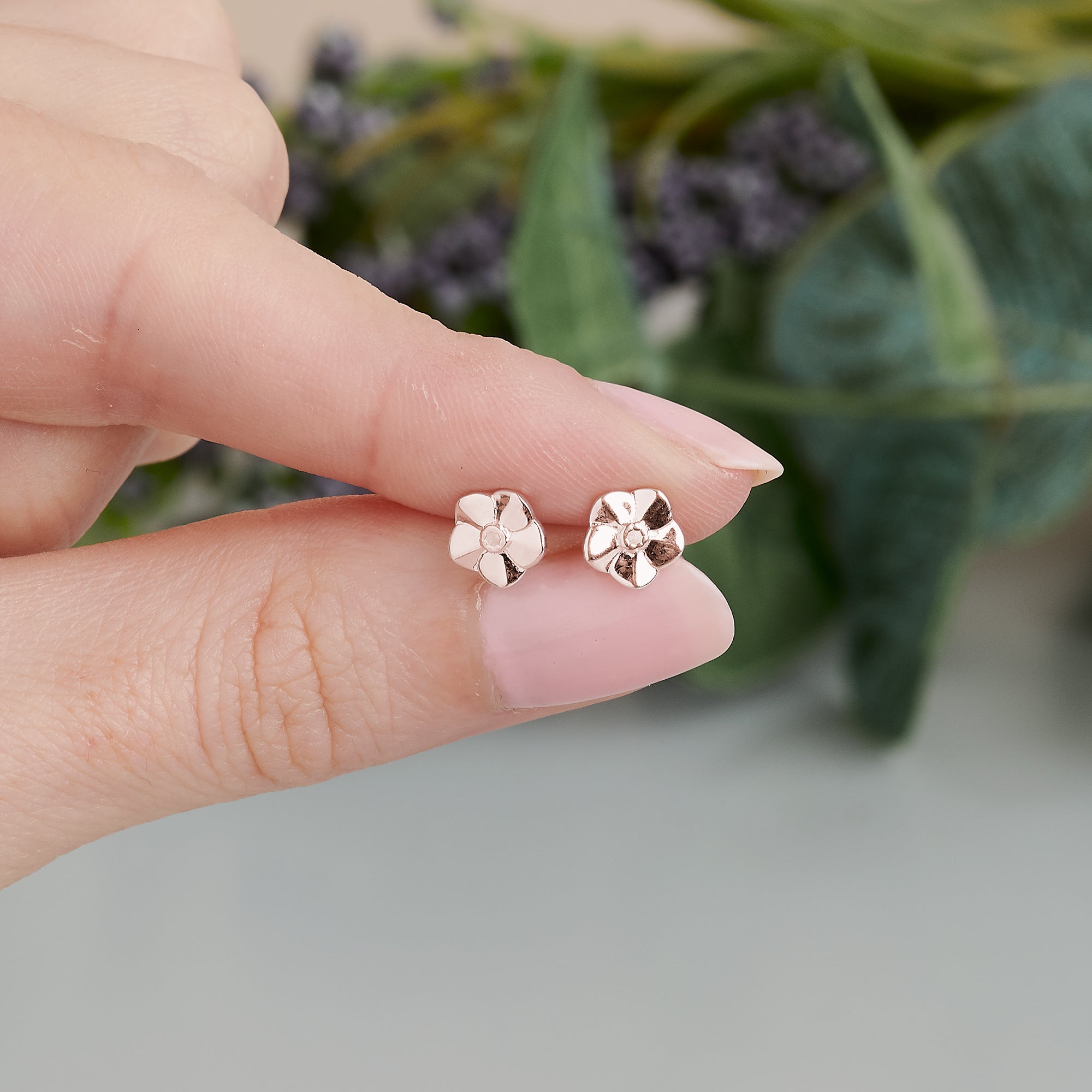 tiny rose gold vermeil stud earrings forget me not flower