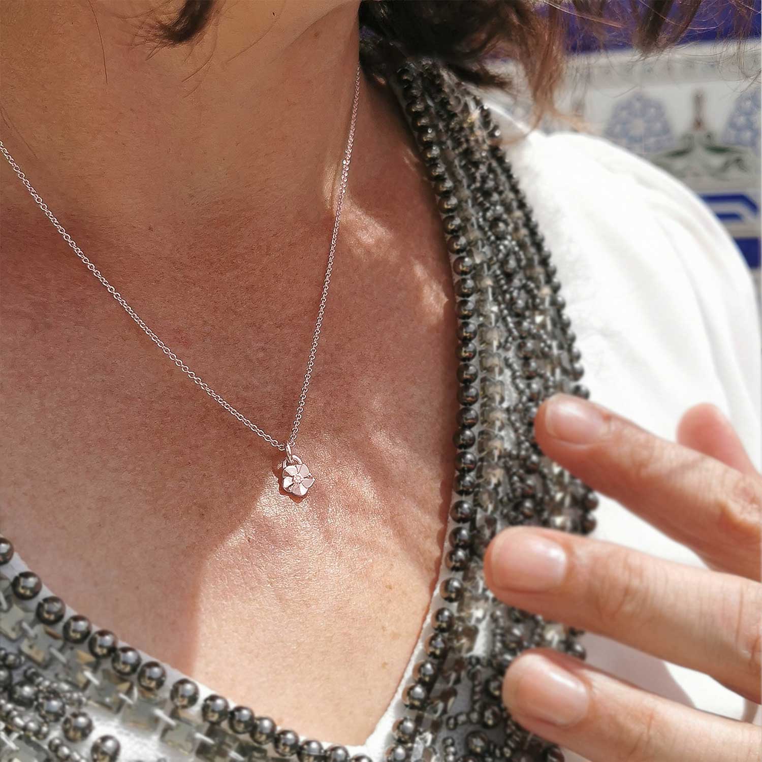 Solid rose gold tiny forget me not flower necklace Scarlett Jewellery