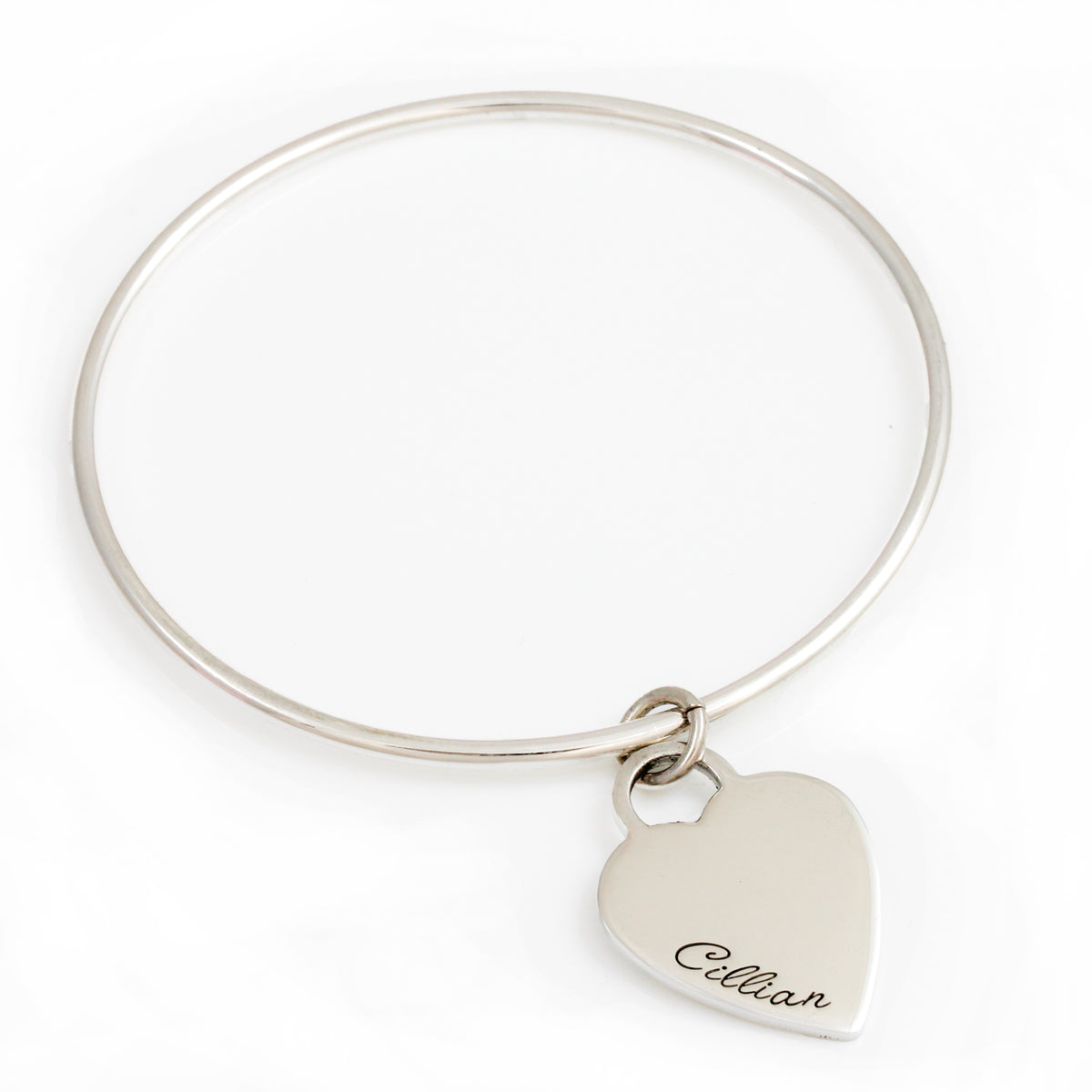 2.5mm wide silver bangle with large tiffany style heart tag engraved with a name
