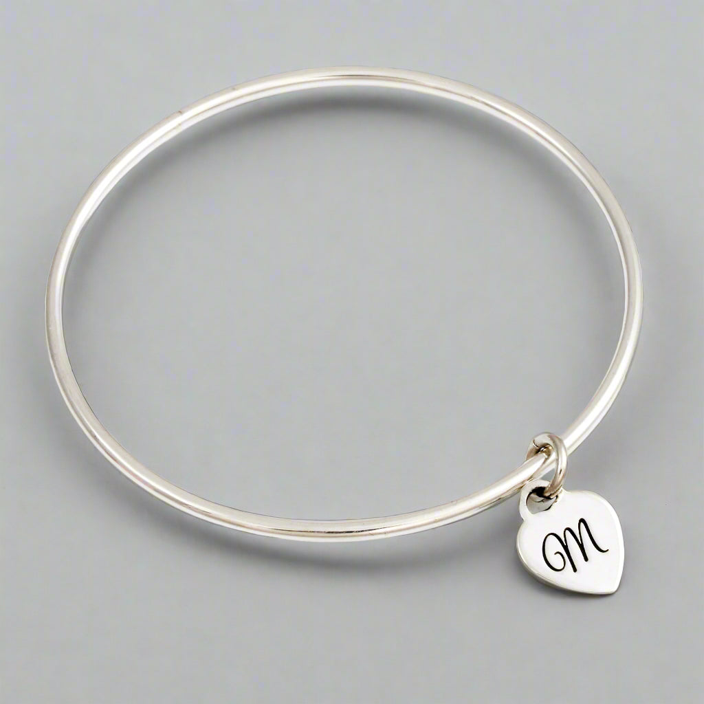 2.5mm bangle with engraved initial on tiny heart tag