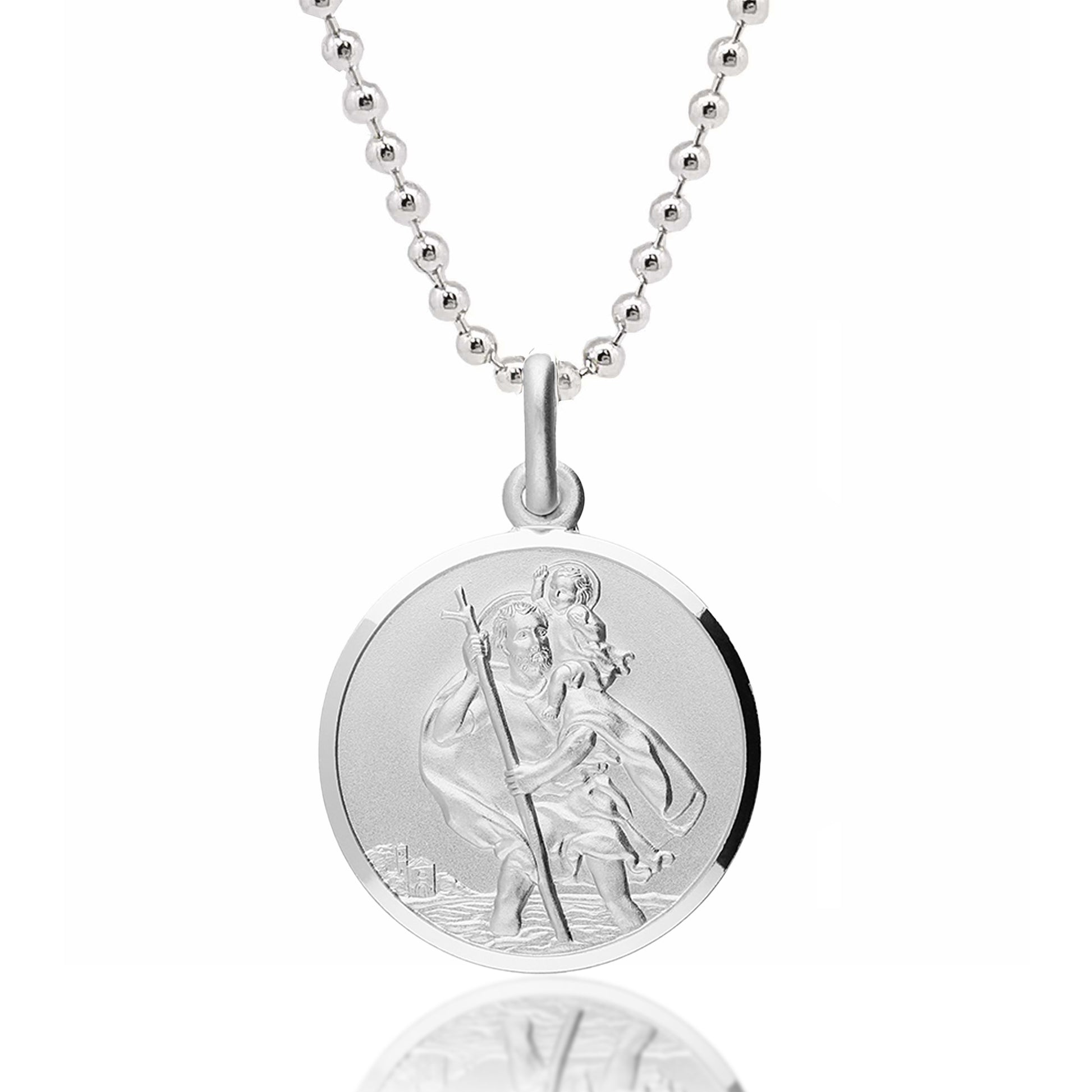 Silver saint christopher necklace with a round pendant featuring an engraved design on a white background
