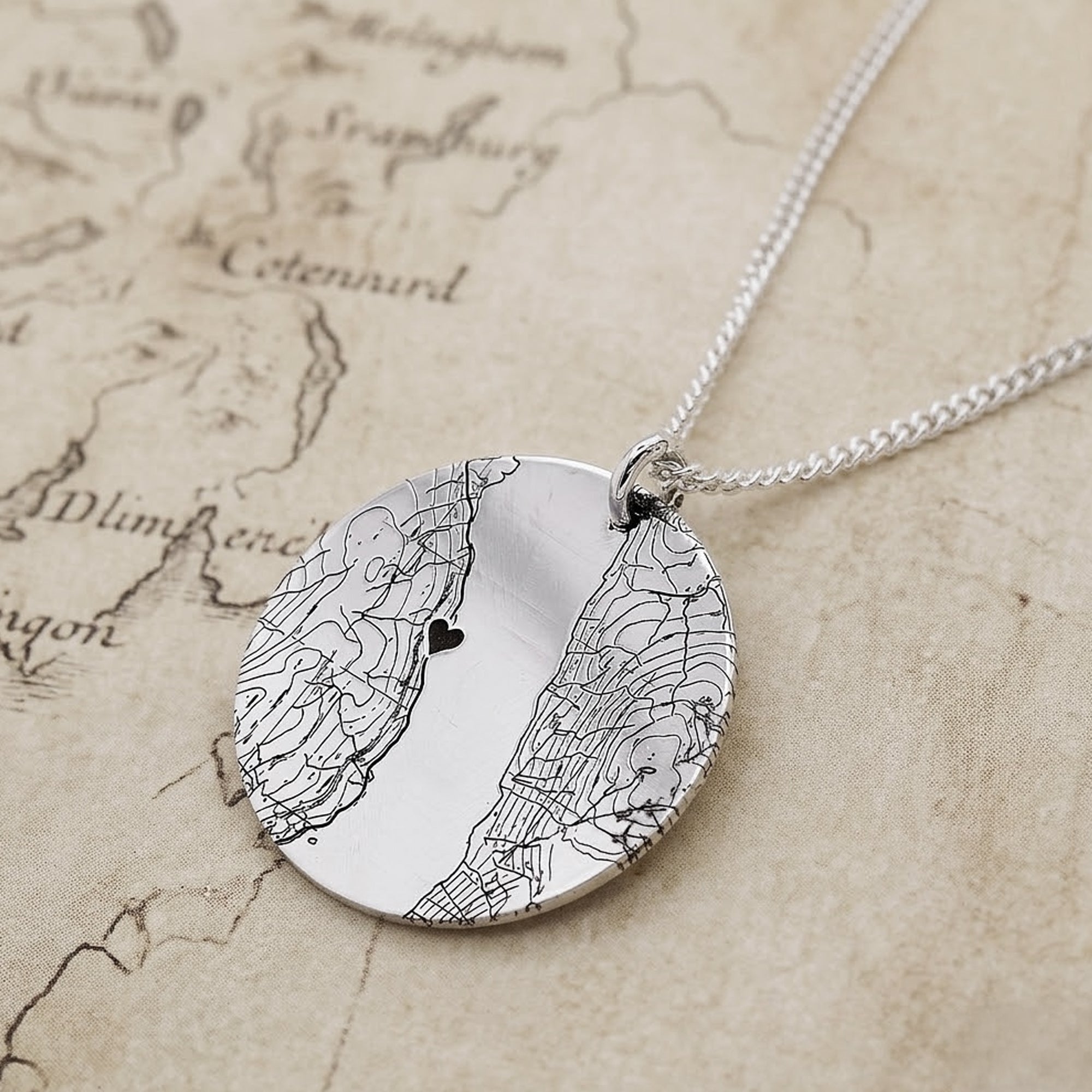 custom map necklace with heart symbol