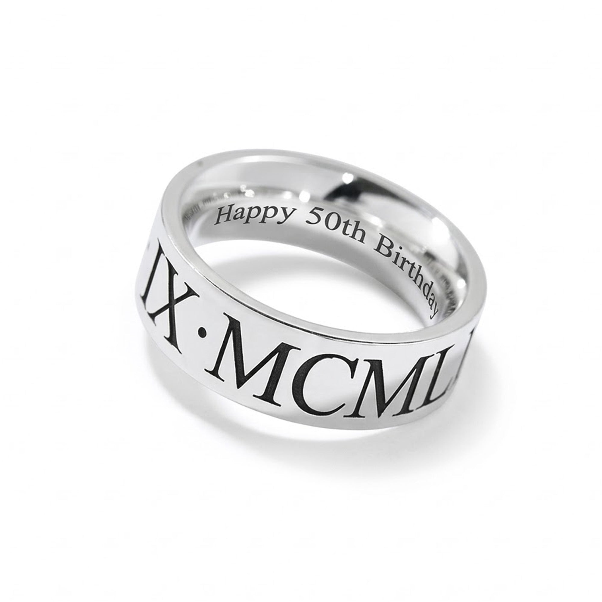 Silver ring with Roman numeral engraving on a white background