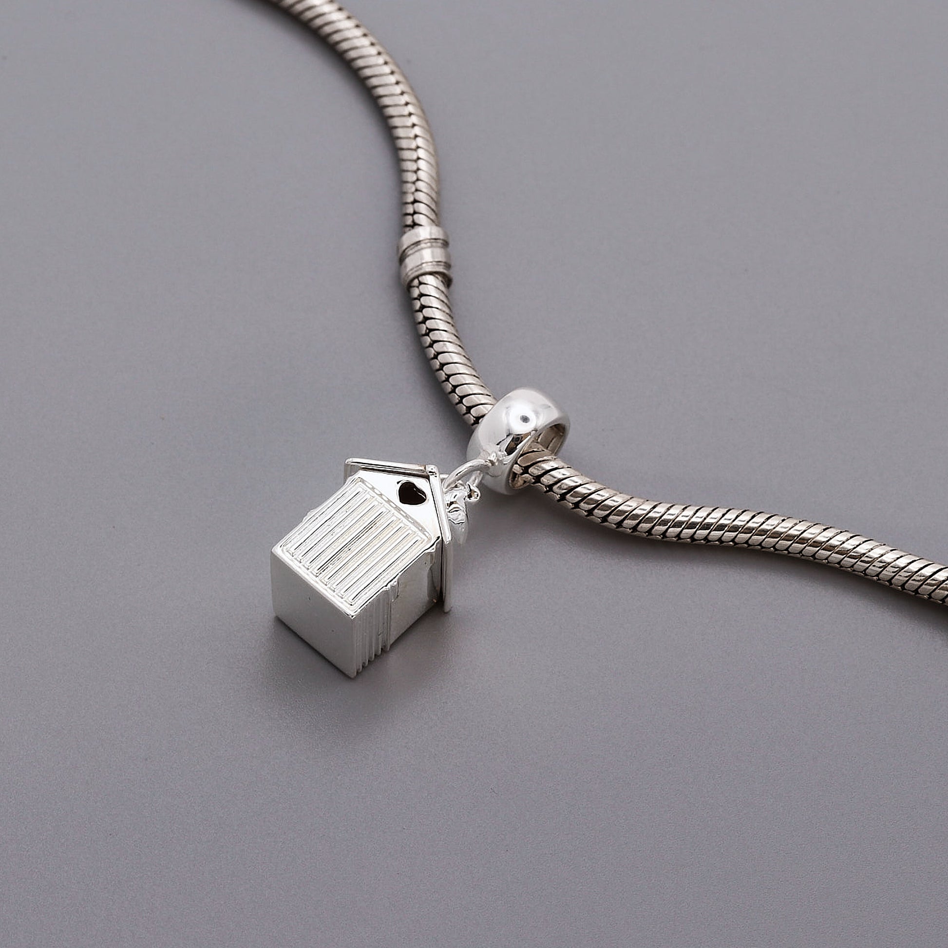 silver bead hut charm on charm carrier pandora compatible
