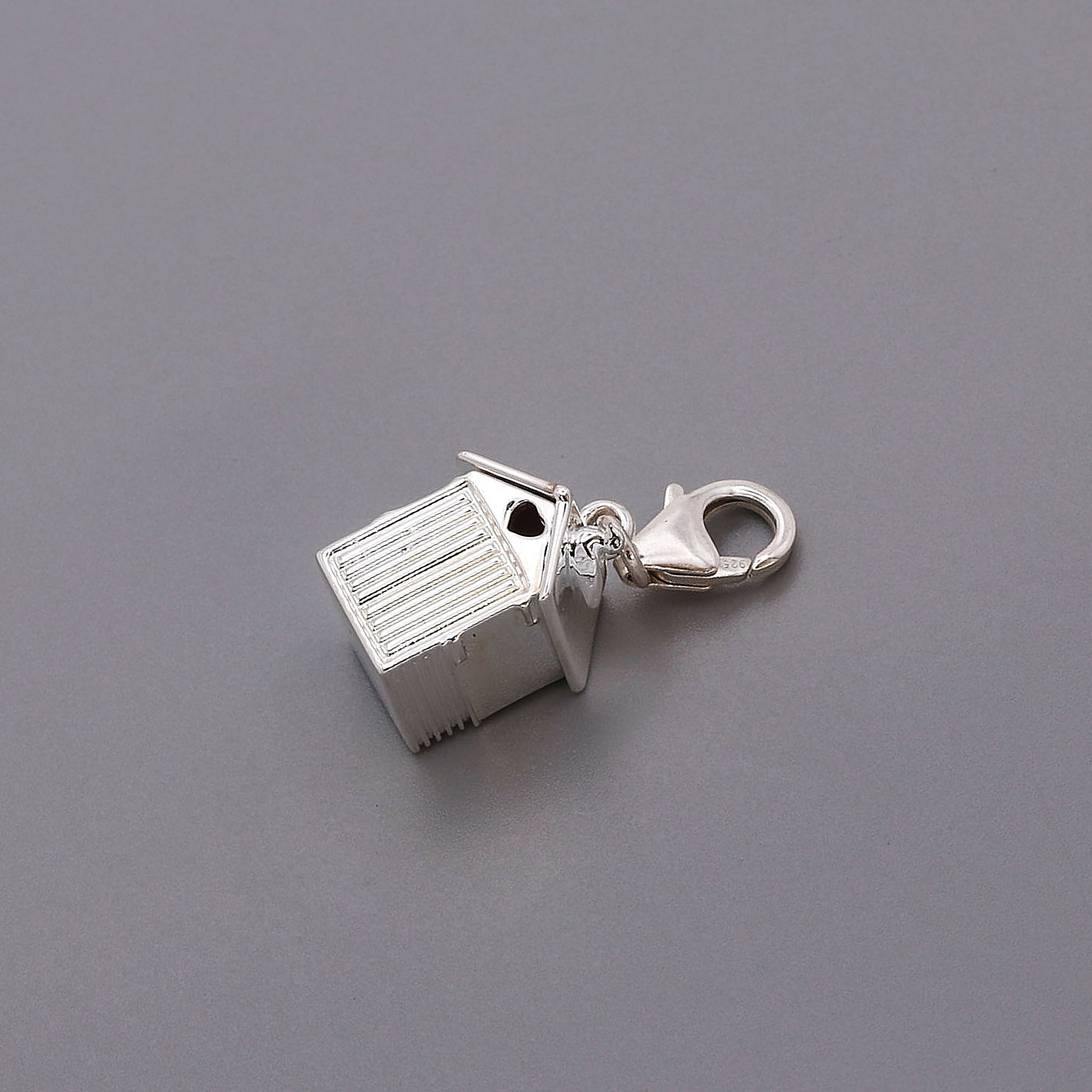 silver beach hut charm on clip on clasp