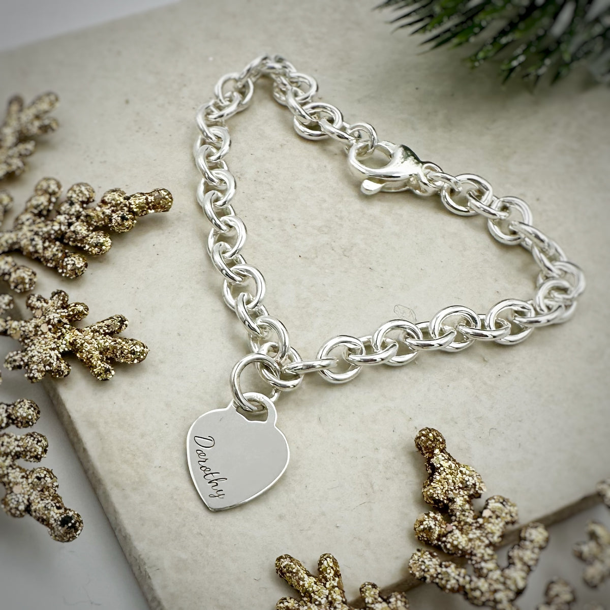 Tiny heart tag charm bracelet engraved with name