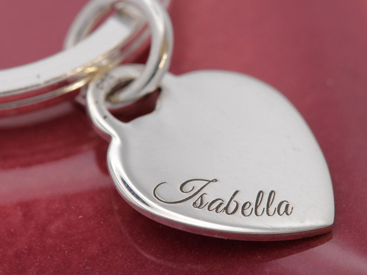 silver mother&#39;s day heart tag keyring with name engraved close up detail
