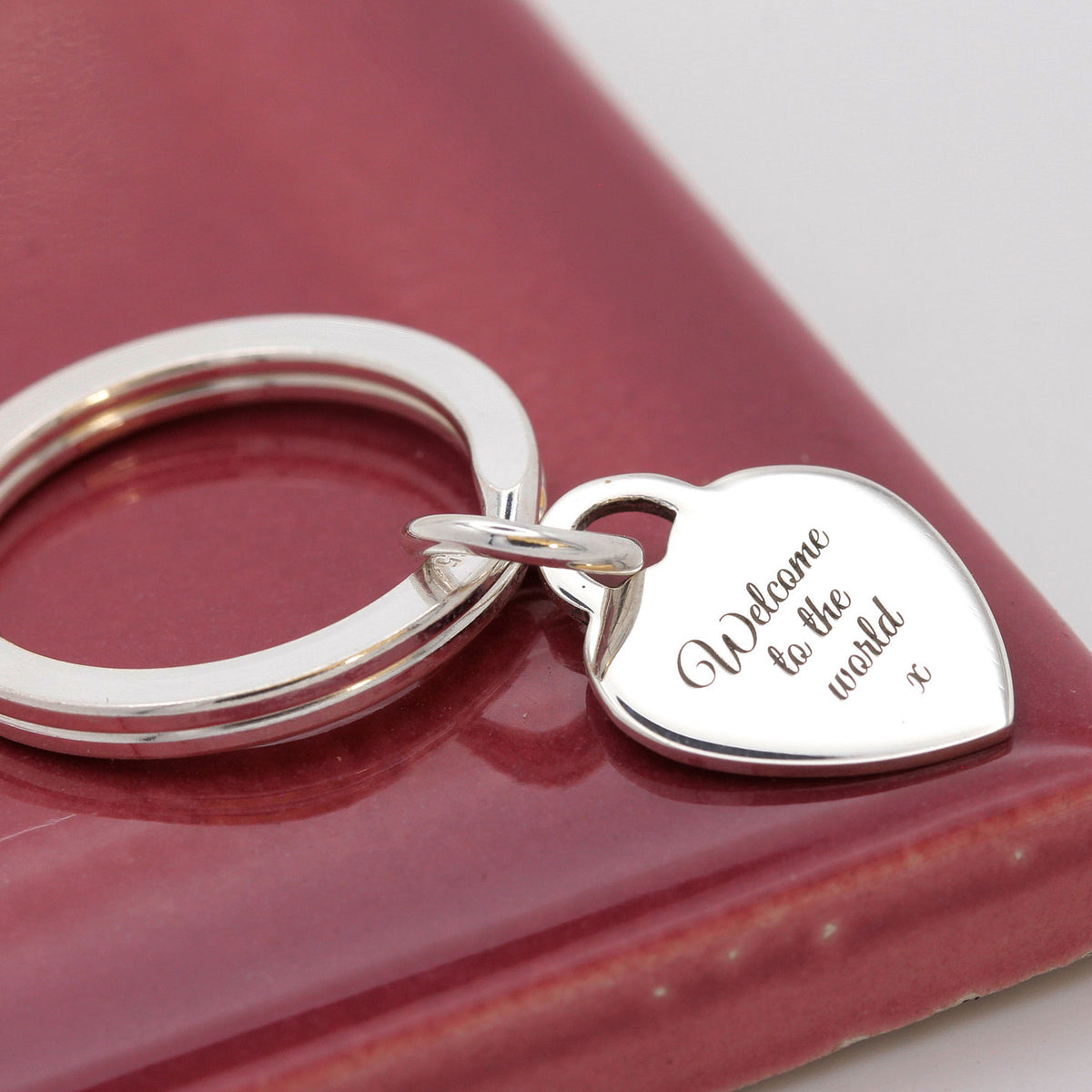 engraved new baby gift heart tag keyring solid silver
