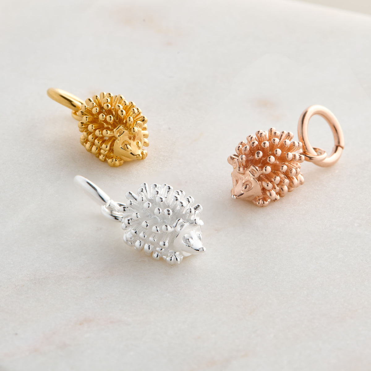 silver or gold plated hedgehog charms