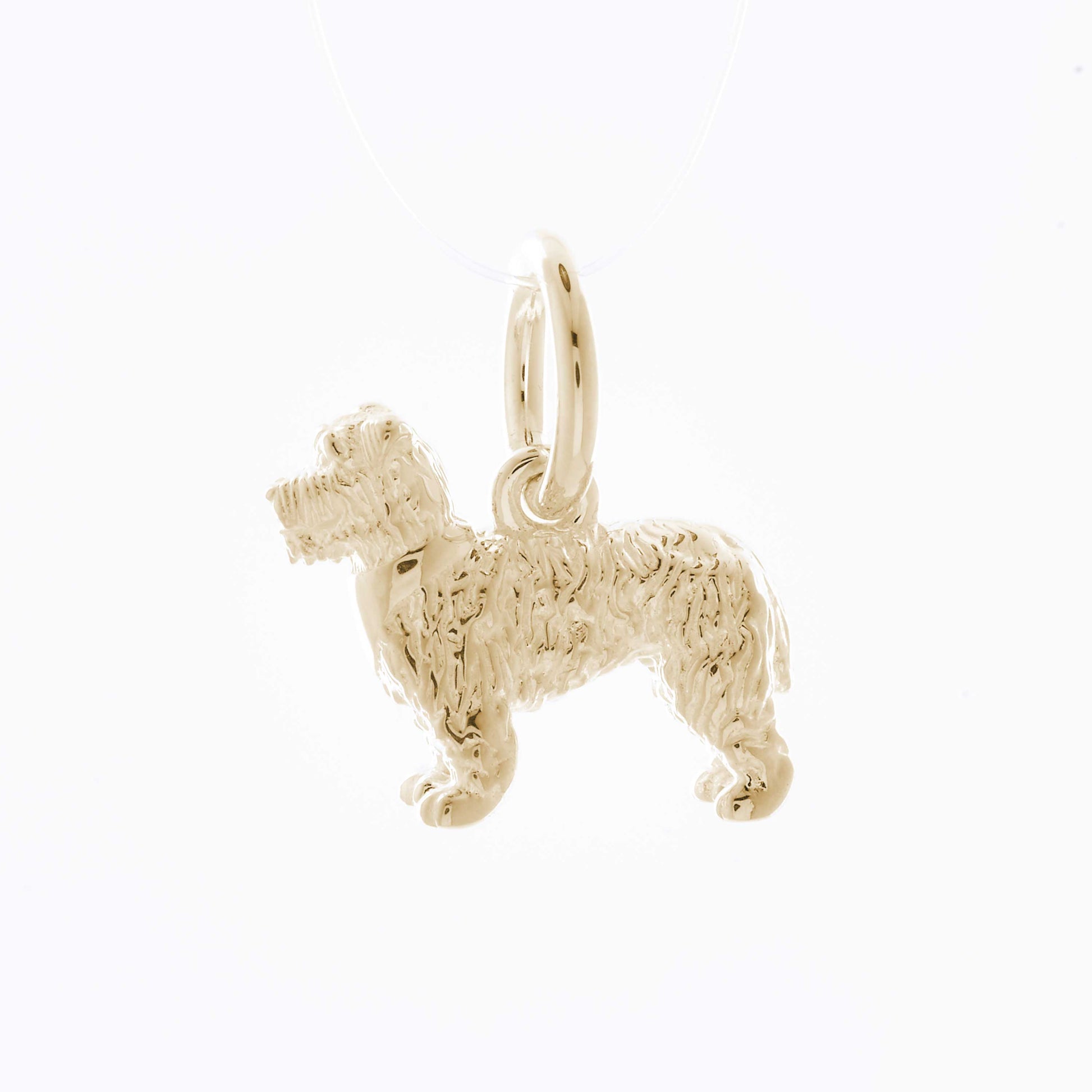 Solid 9ct gold Miniature Schnauzer charm with tiny bandana (optional), perfect for a charm bracelet or necklace.