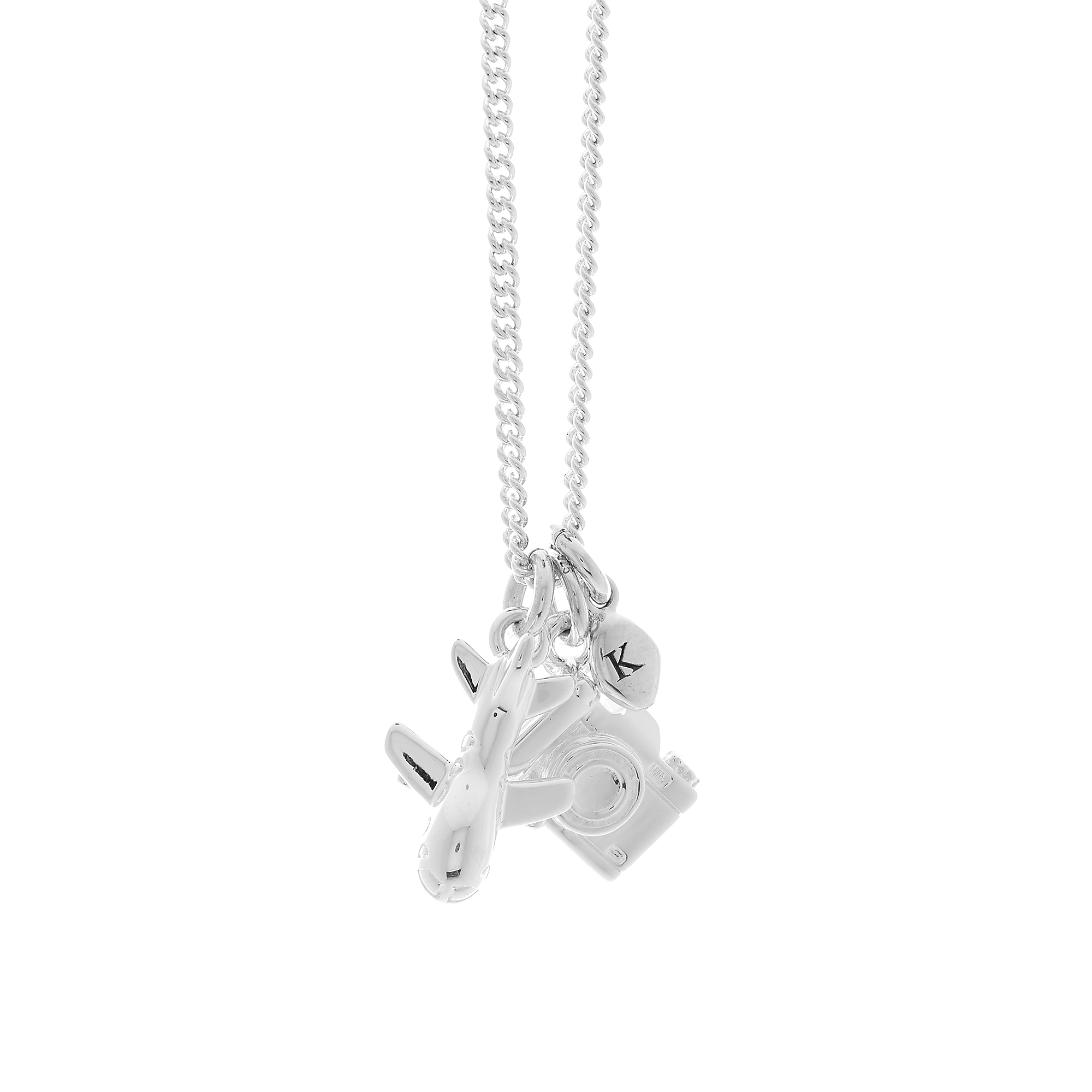 Silver travel themed necklace with aeroplane & SLR camera charms on a white background