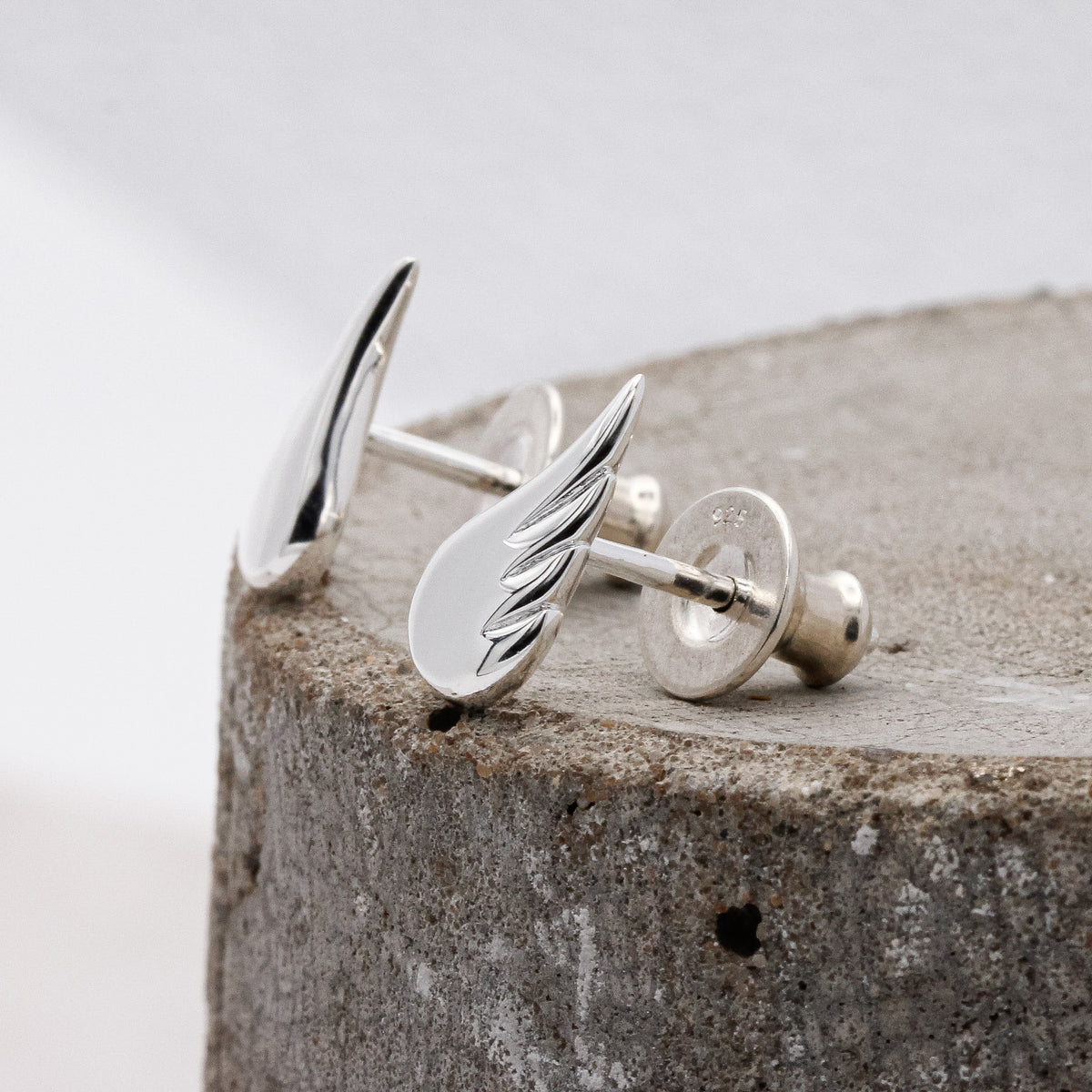 silver angel wing stud earrings christening gift side view