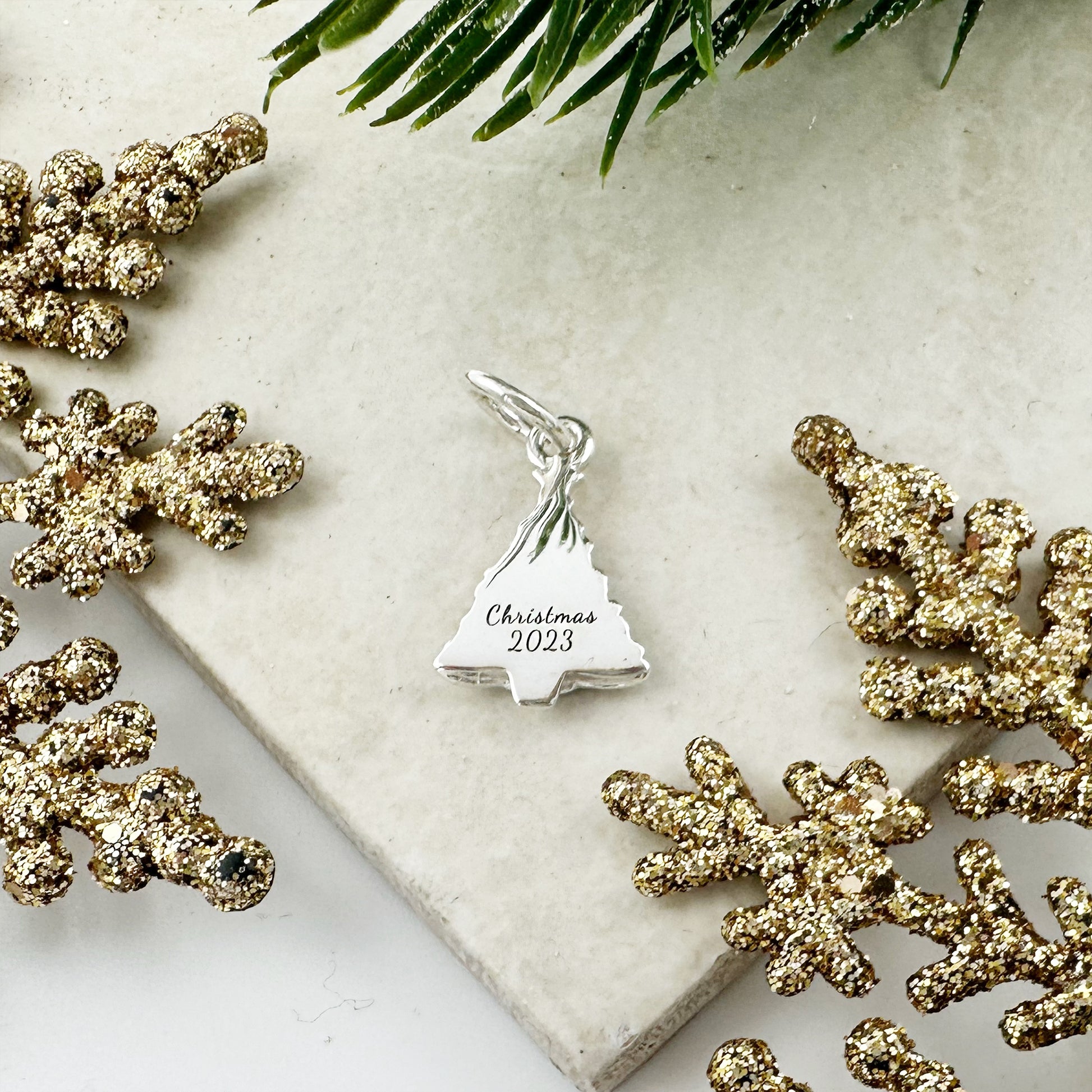 christmas tree silver charm engraved on the back