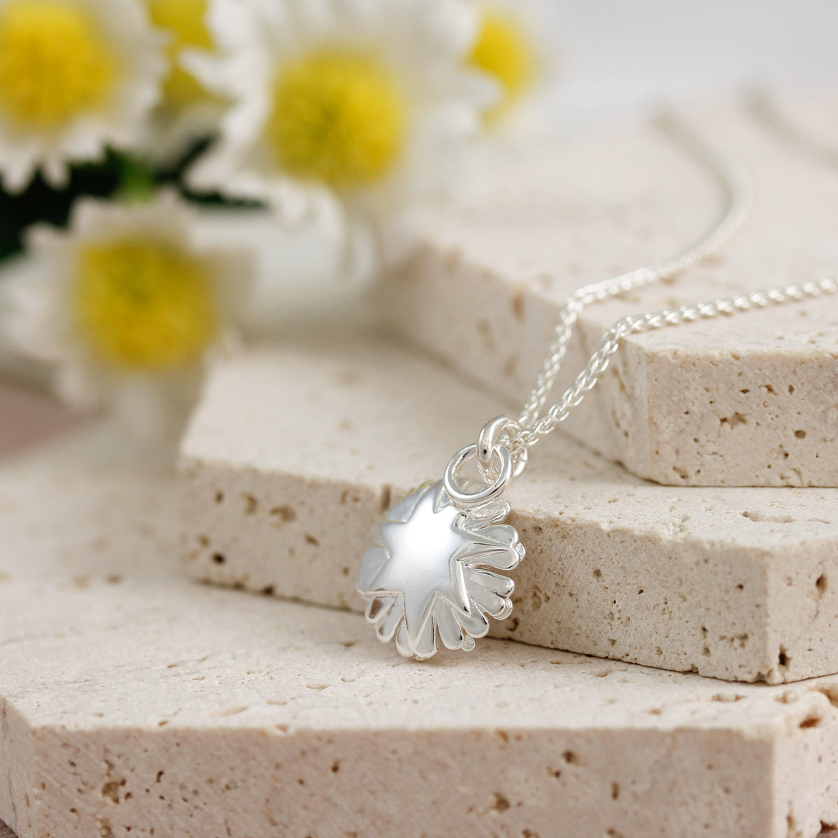 back of daisy flower charm necklace