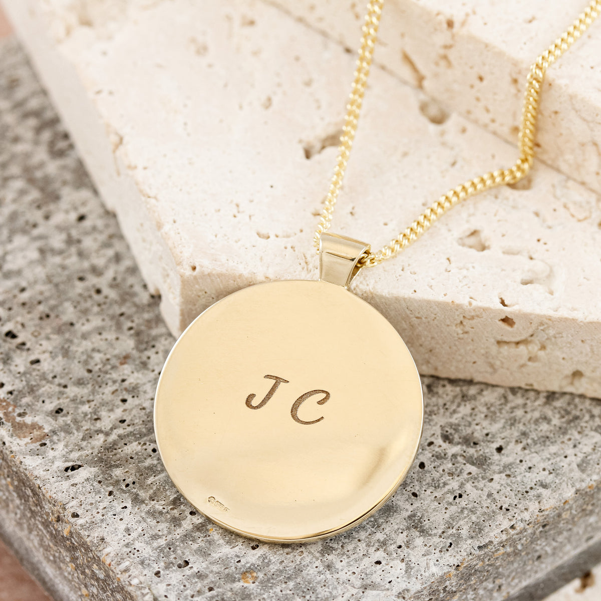 solid gold rune necklace engraved back on heavier gold curb chain