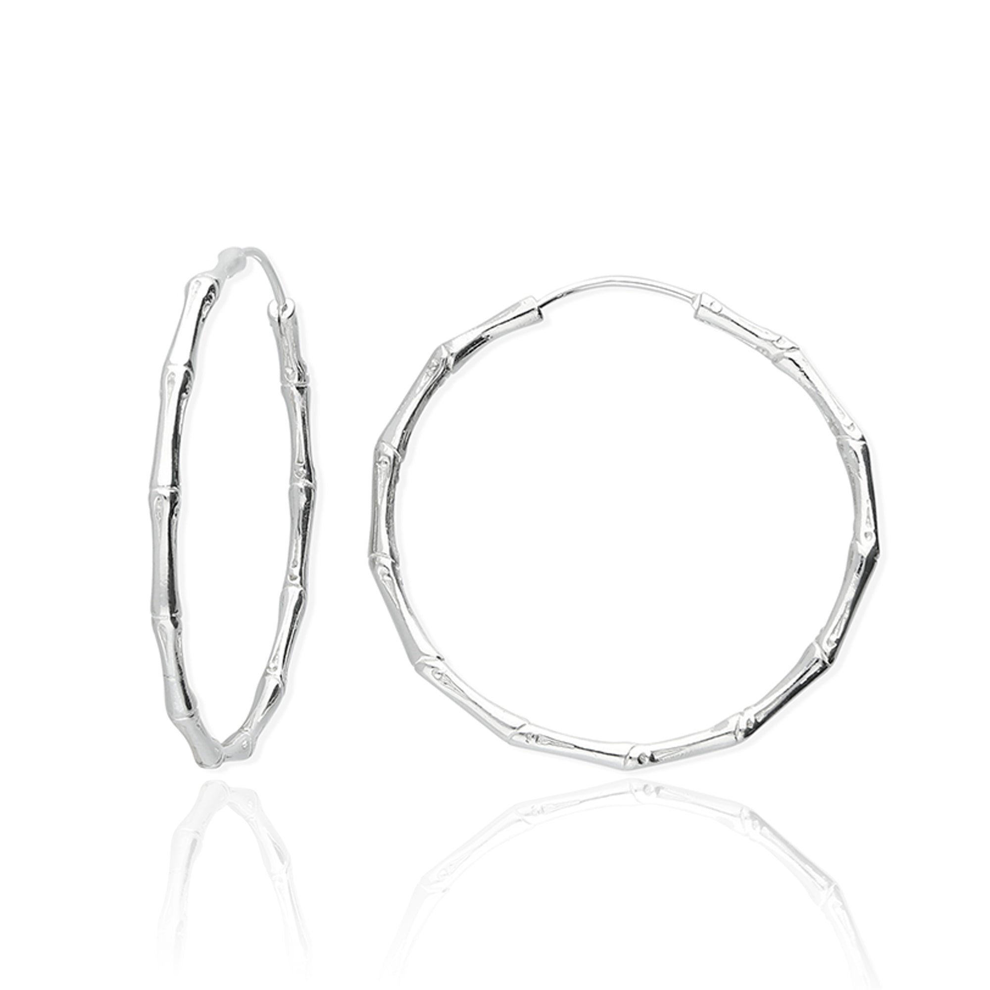 Silver hoop earrings on a white background