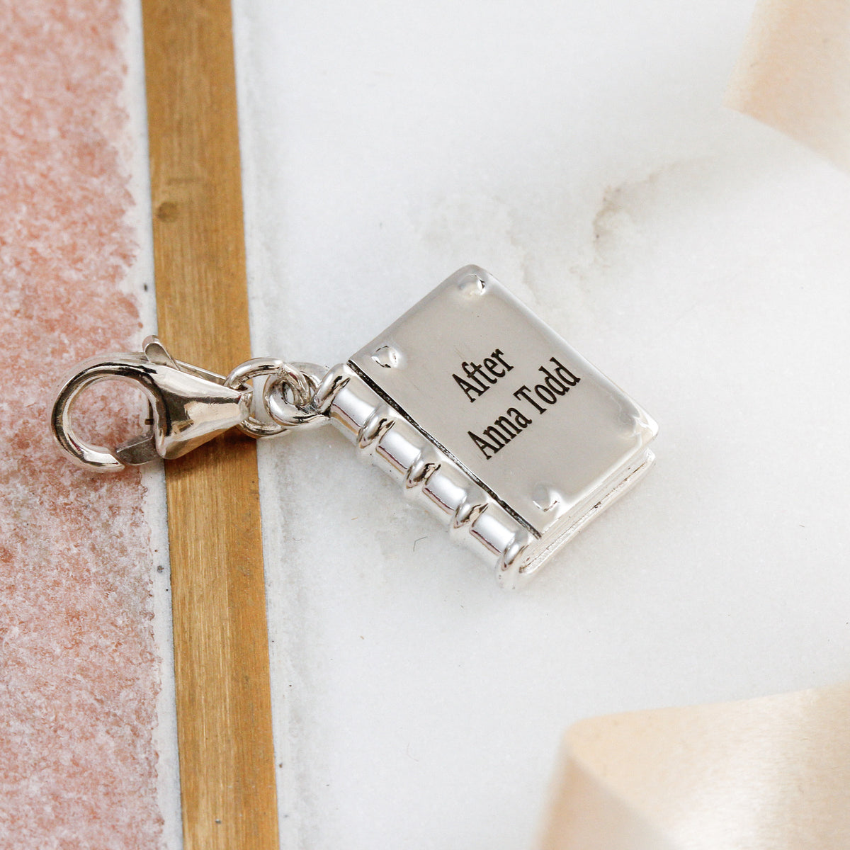 sterling silver book charm with clip on lobster clasp from Scarlett Jewellery