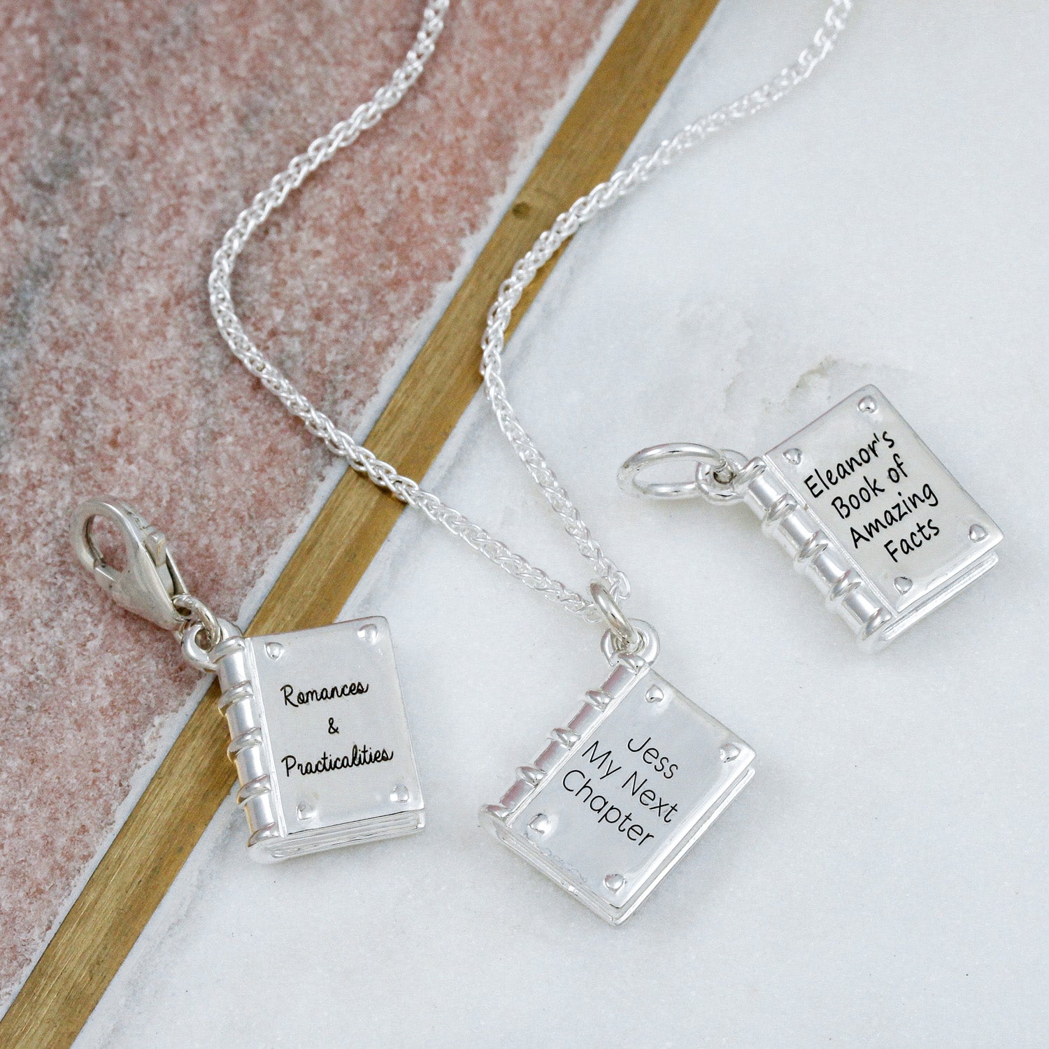 silver book charms as clip clasp necklace or for a bracelet personalised as birthday gifts for authors