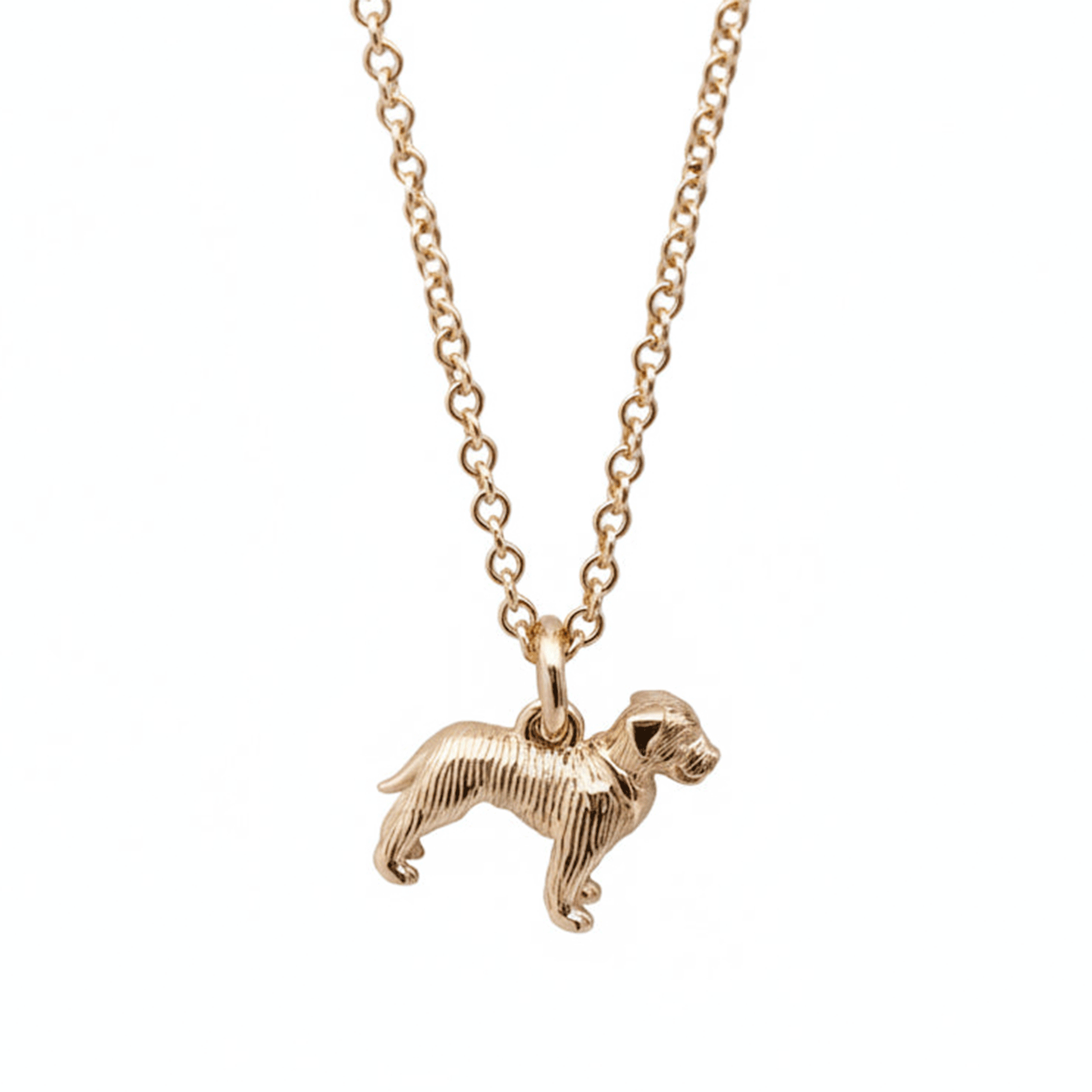 Gold border terrier dog-shaped pendant on a chain against a white background